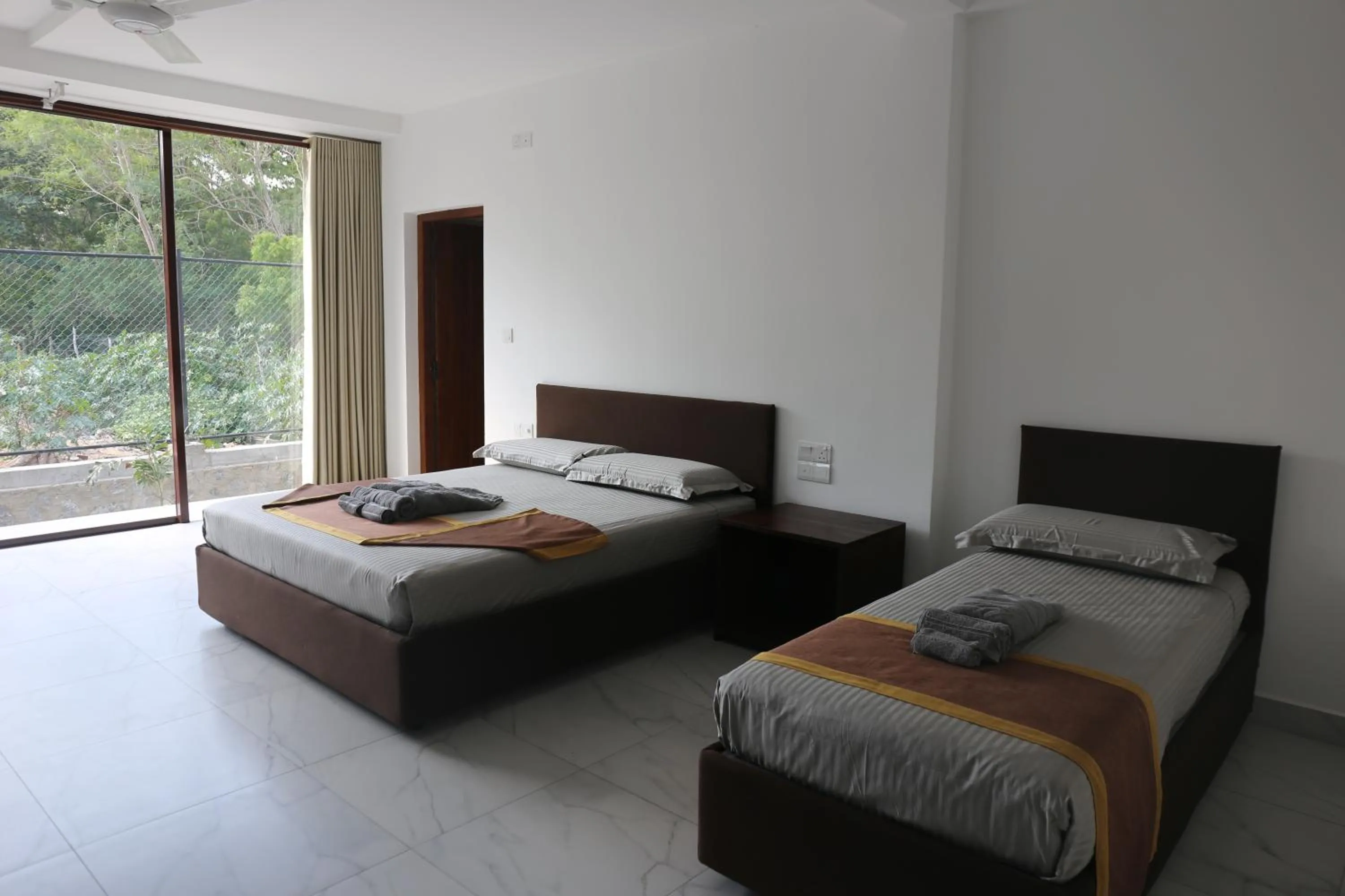 Bed in Amanda Beach Resort