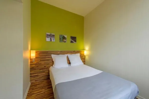 Bed in Appart Hôtel Lyon Villemanzy