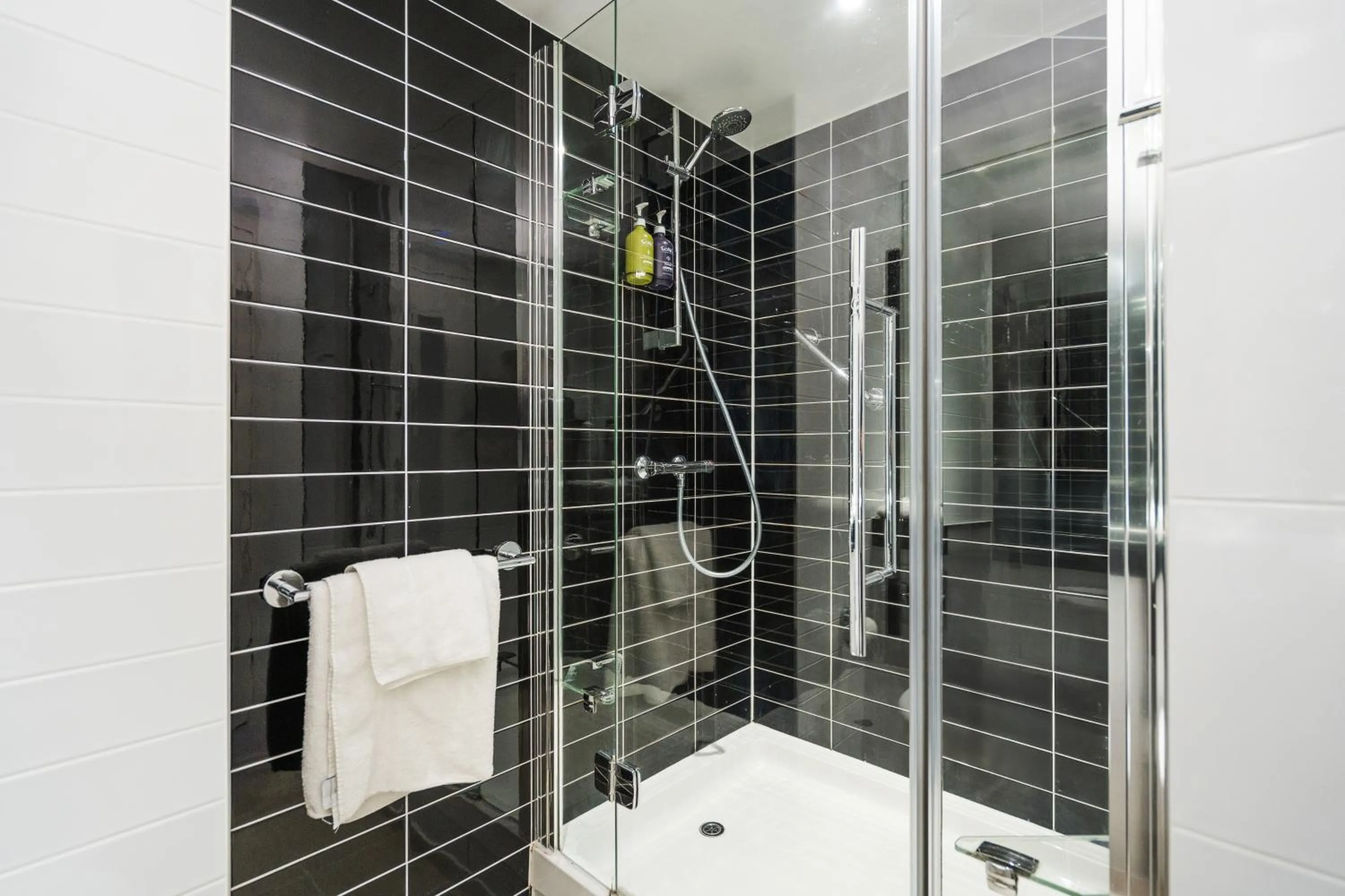 Shower in Holiday Inn Express Cambridge Duxford M11 Jct 10, an IHG Hotel