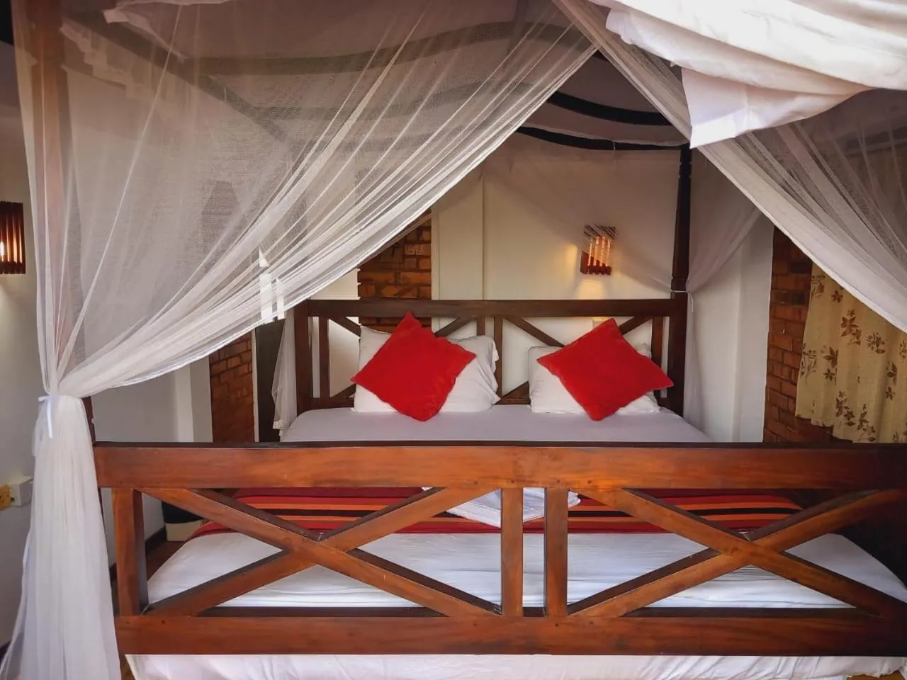 Bed in Blue Horizon Beach Hotel