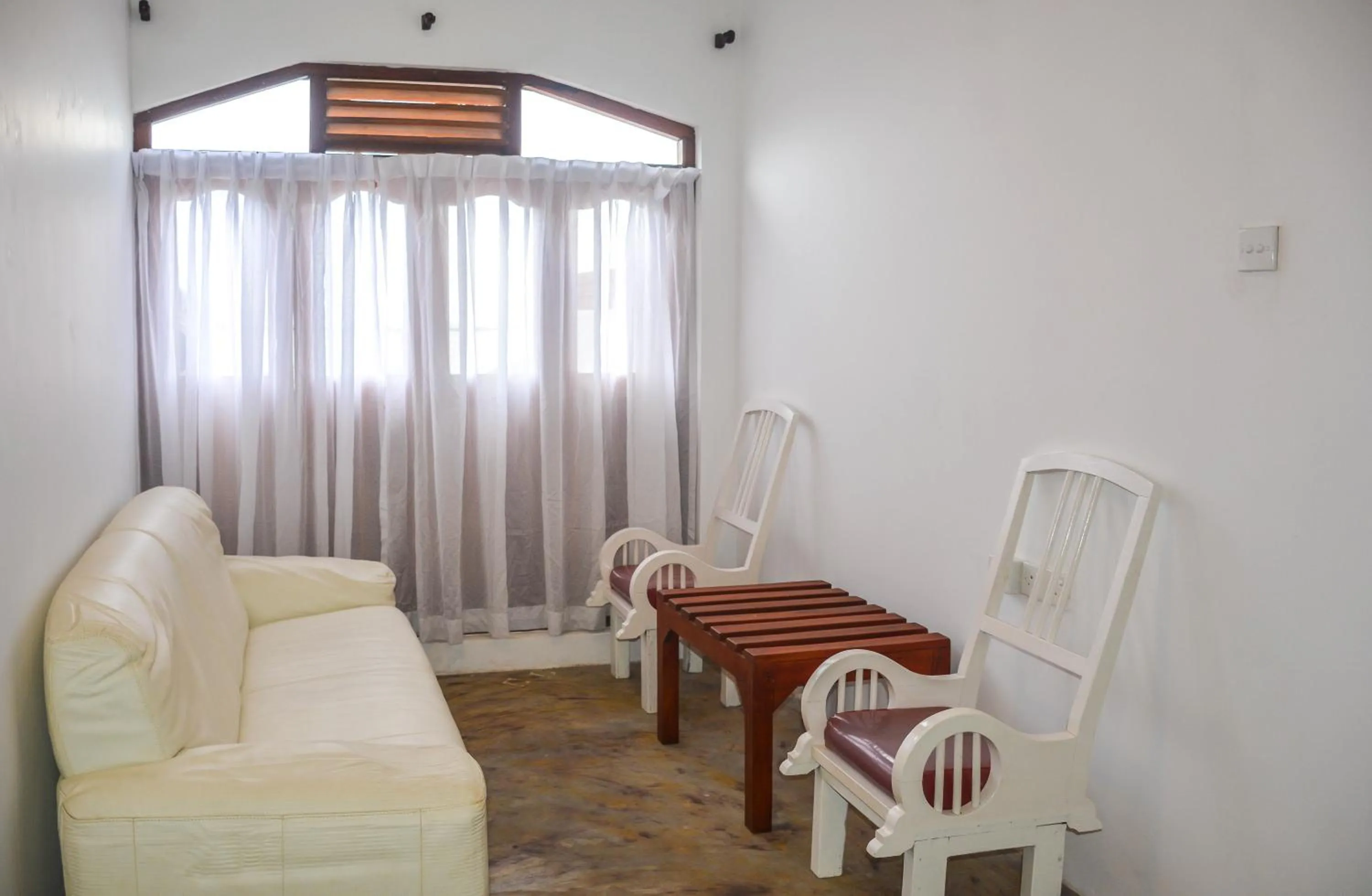 Living room in Blue Horizon Beach Hotel