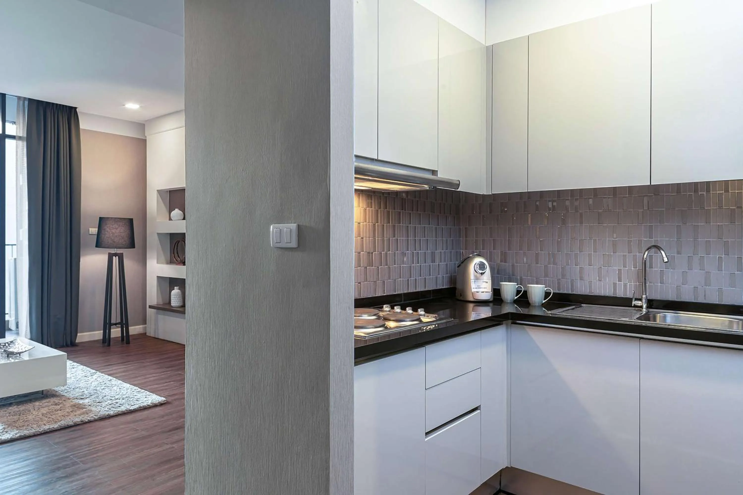 Kitchen or kitchenette in Metropolis Suites Bangkok, Tapestry Collection by Hilton