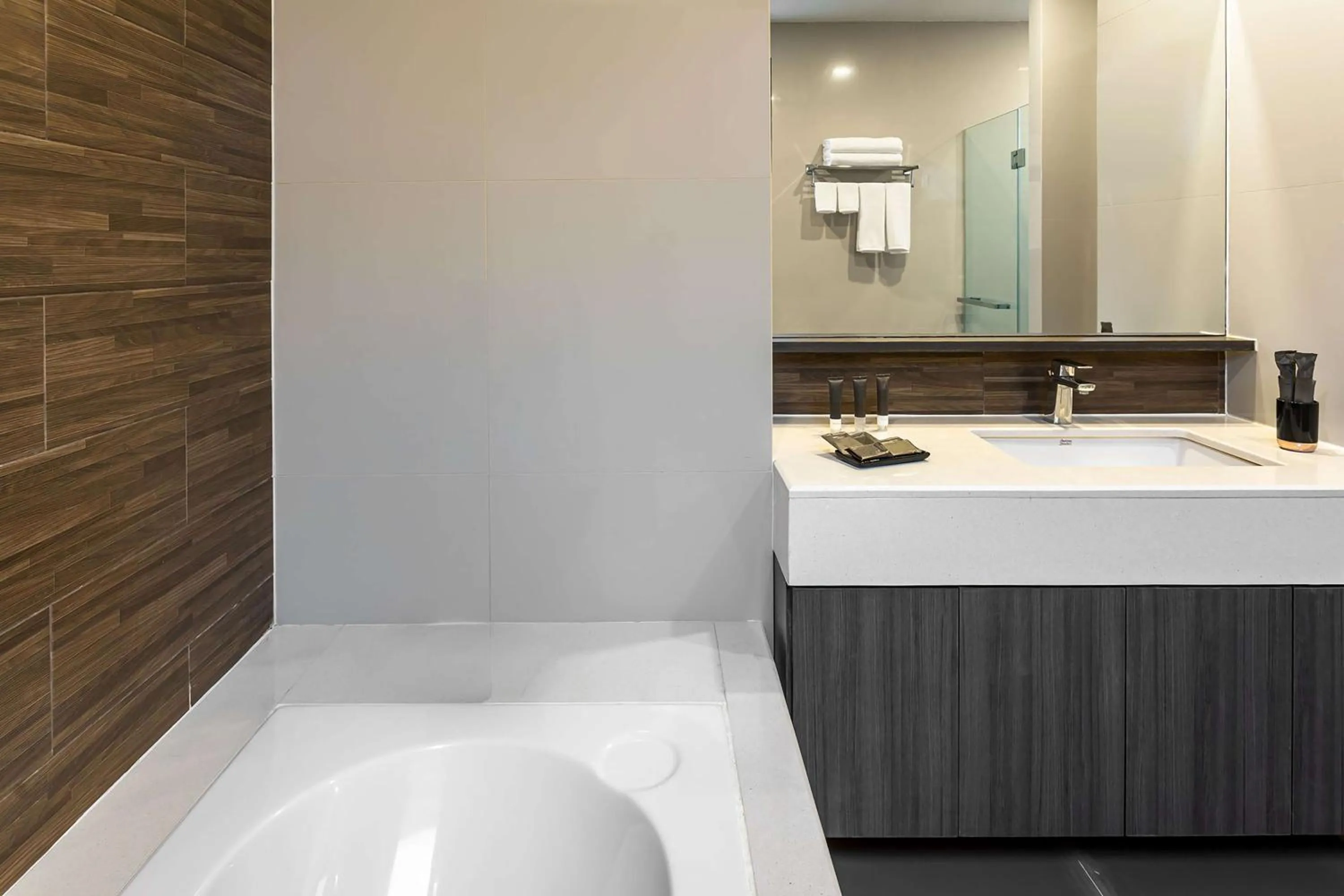 Bathroom in Metropolis Suites Bangkok, Tapestry Collection by Hilton