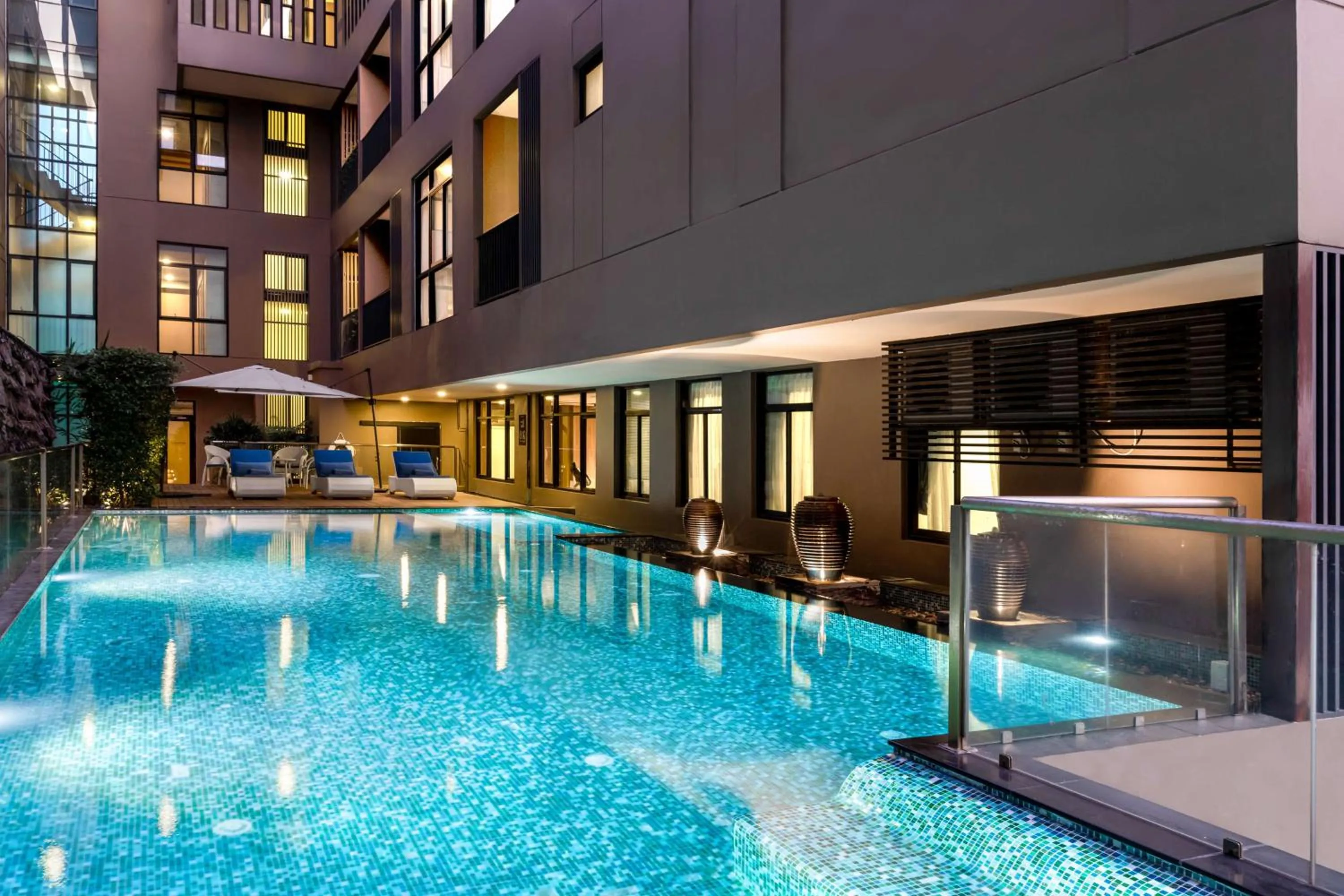 Pool view in Metropolis Suites Bangkok, Tapestry Collection by Hilton