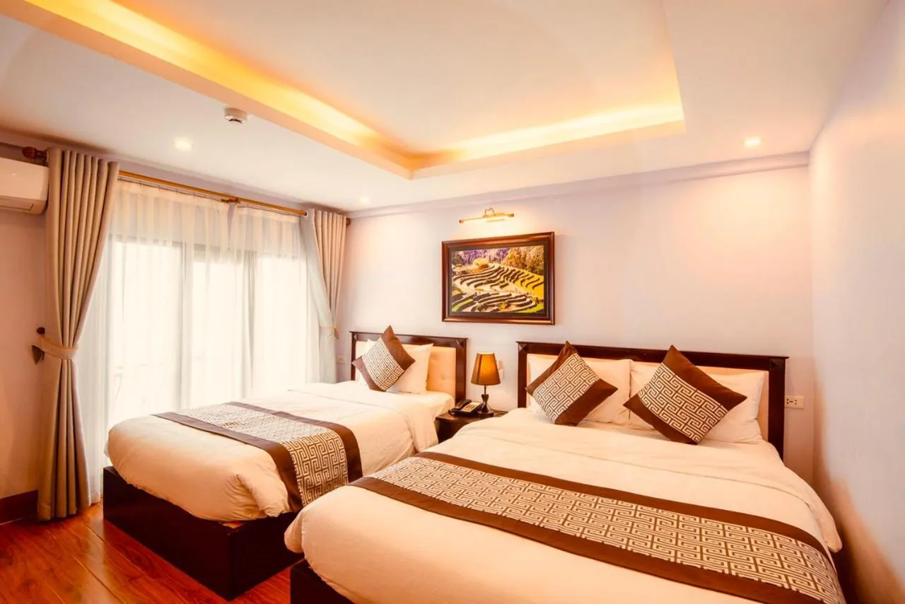 Bed in Le Bordeaux Sapa Hotel