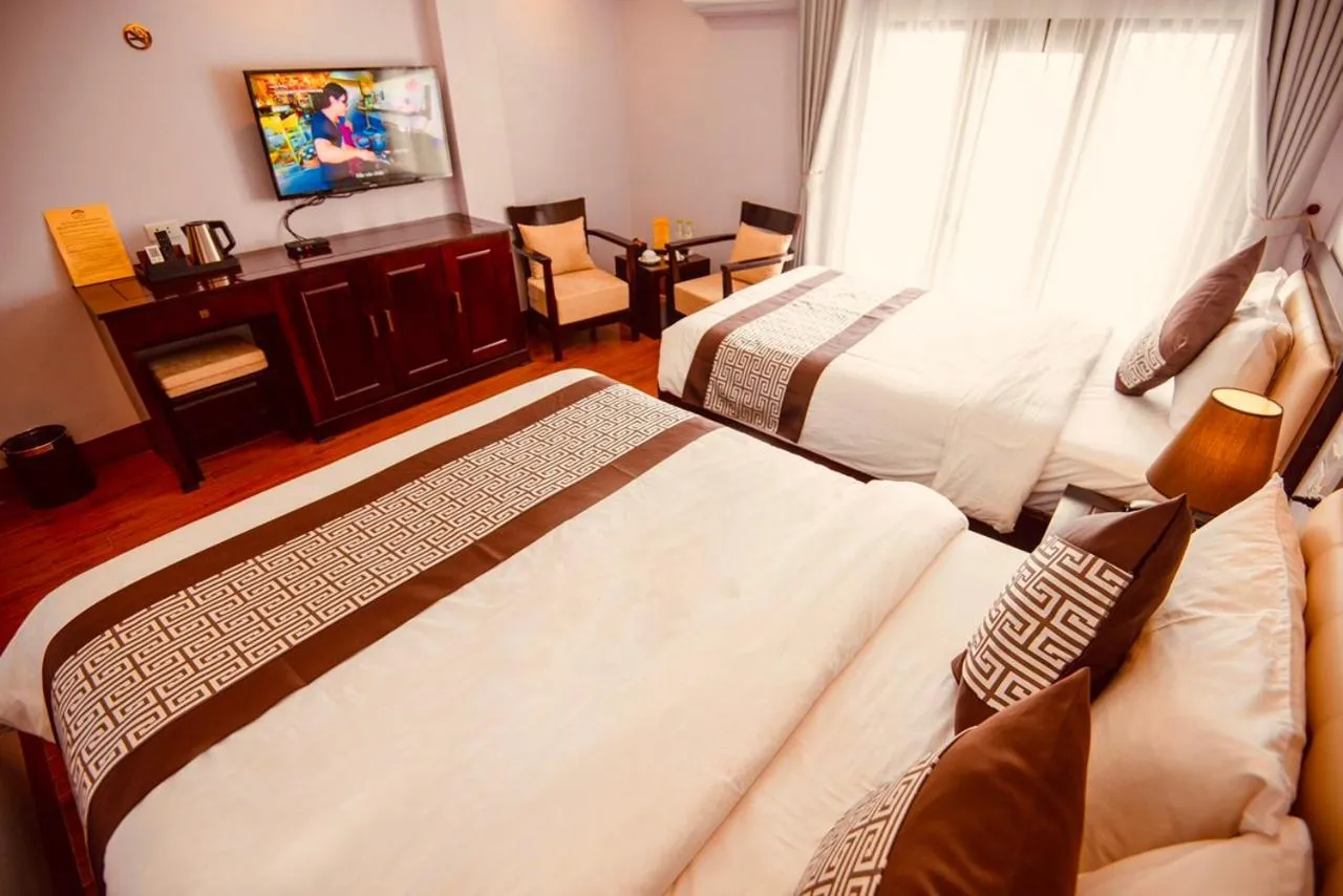 Bed in Le Bordeaux Sapa Hotel