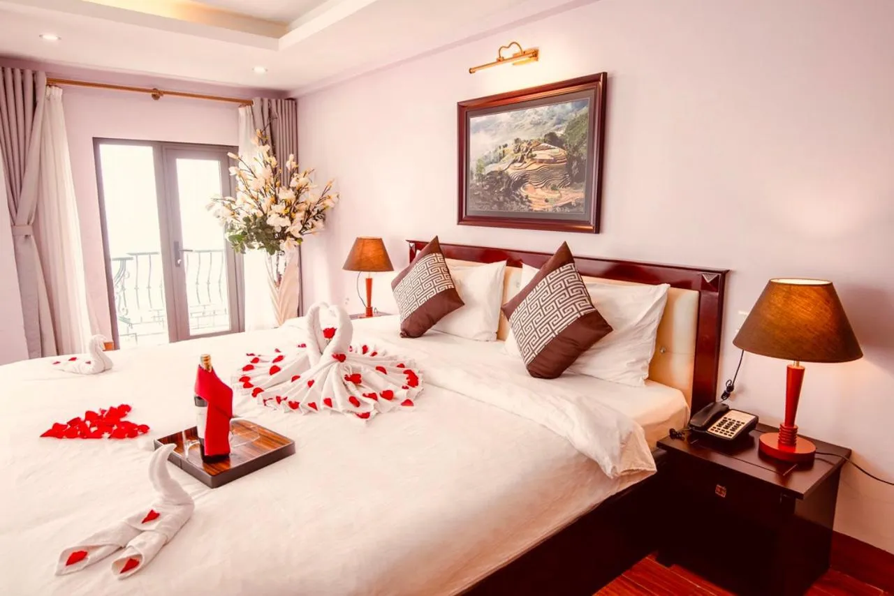 Bed in Le Bordeaux Sapa Hotel