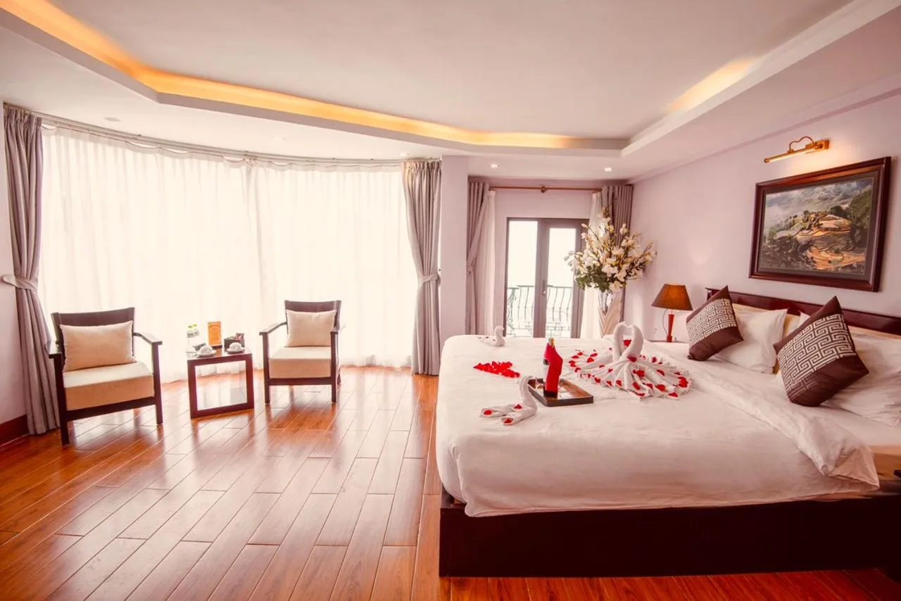 Bed in Le Bordeaux Sapa Hotel