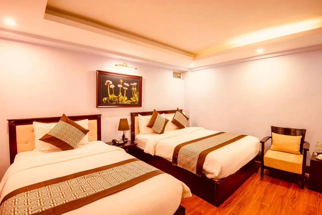 Bed in Le Bordeaux Sapa Hotel