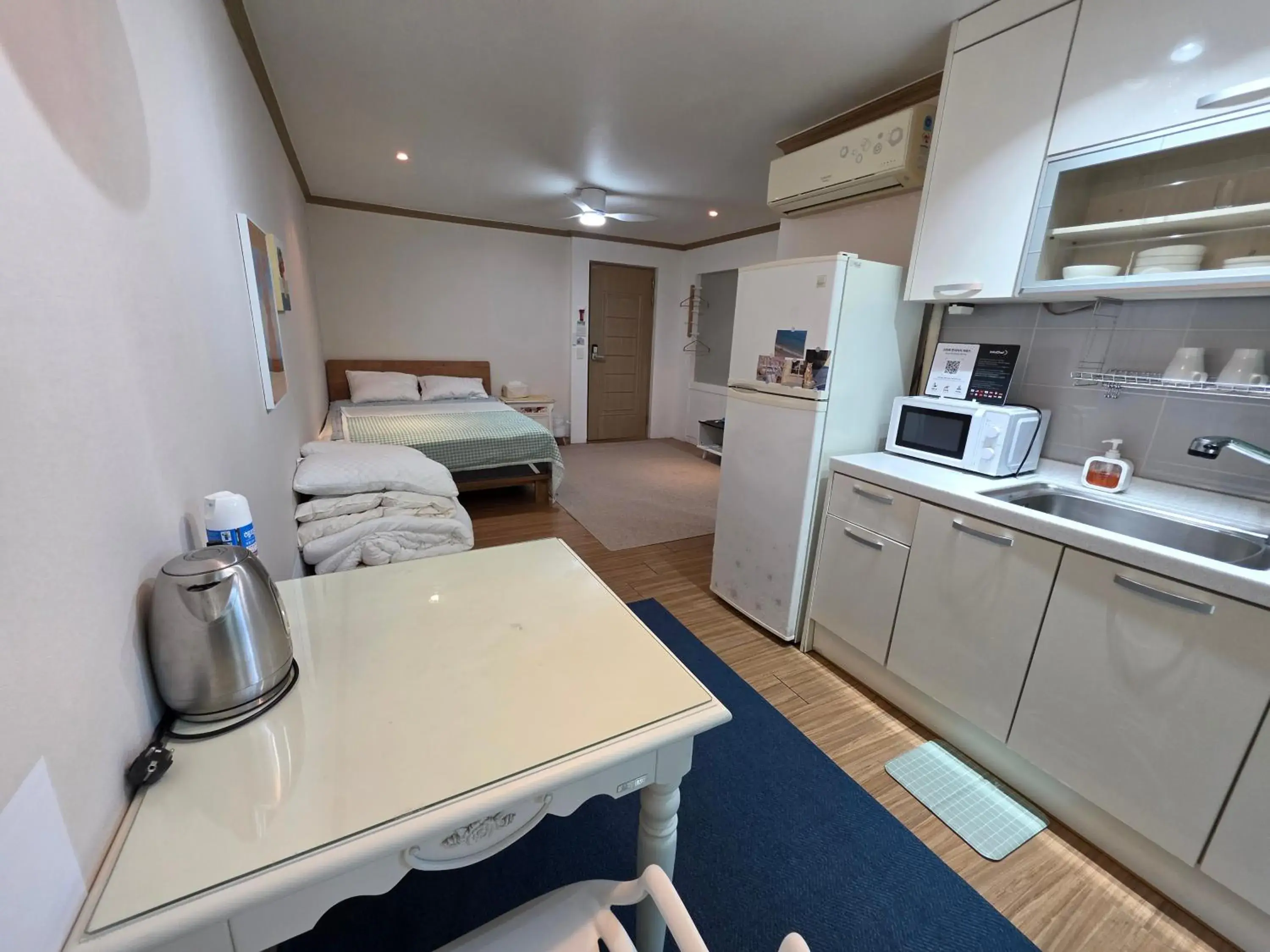 Bed in Bellus-Rose Pension Gyeongju Bed in Bellus-Rose Pension Gyeongju