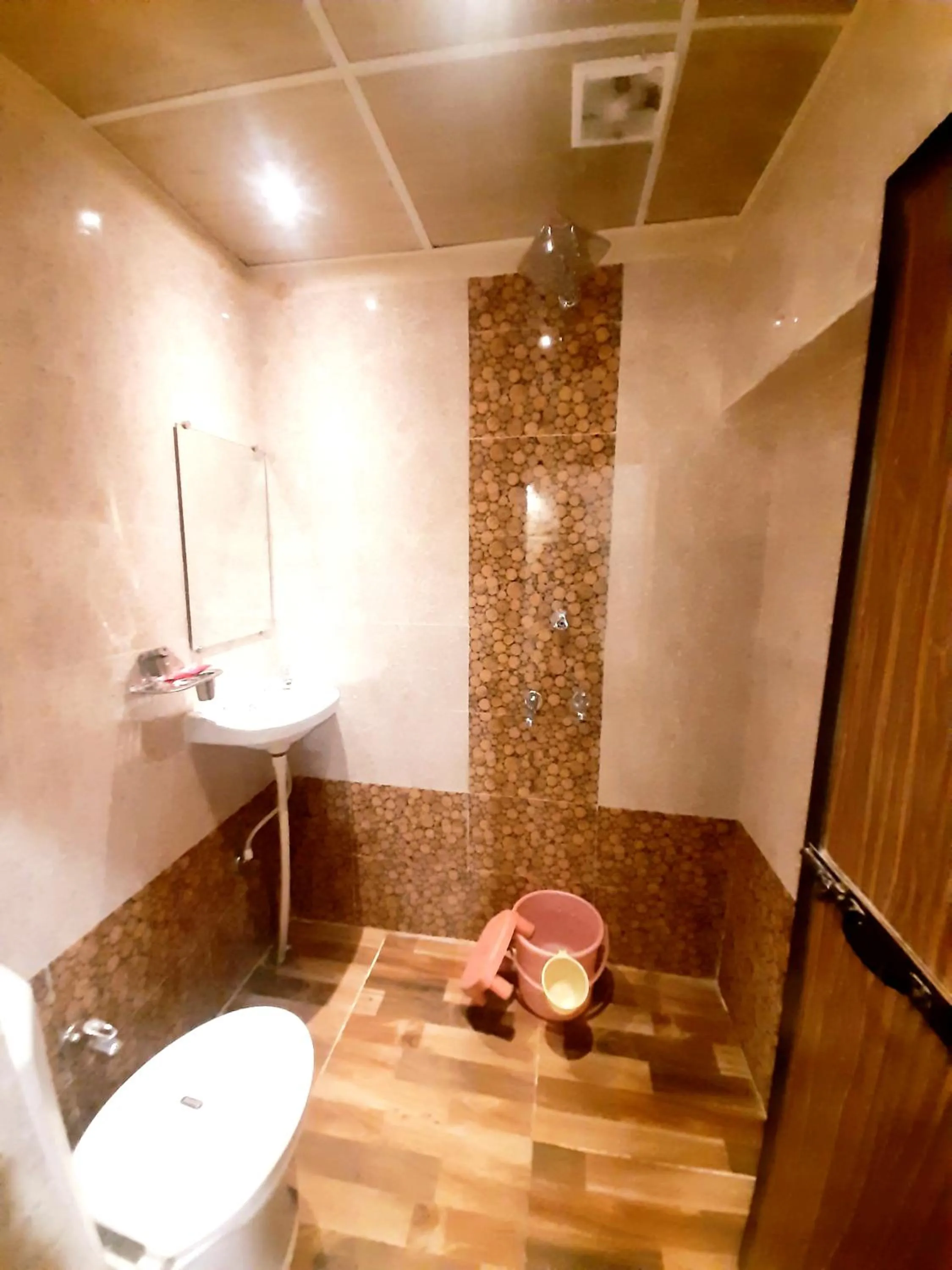 Bathroom in Luxmi Hotel