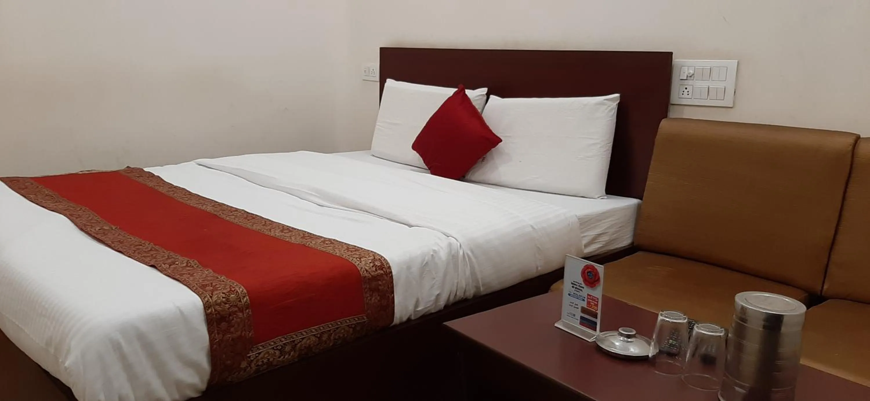 Bed in Luxmi Hotel