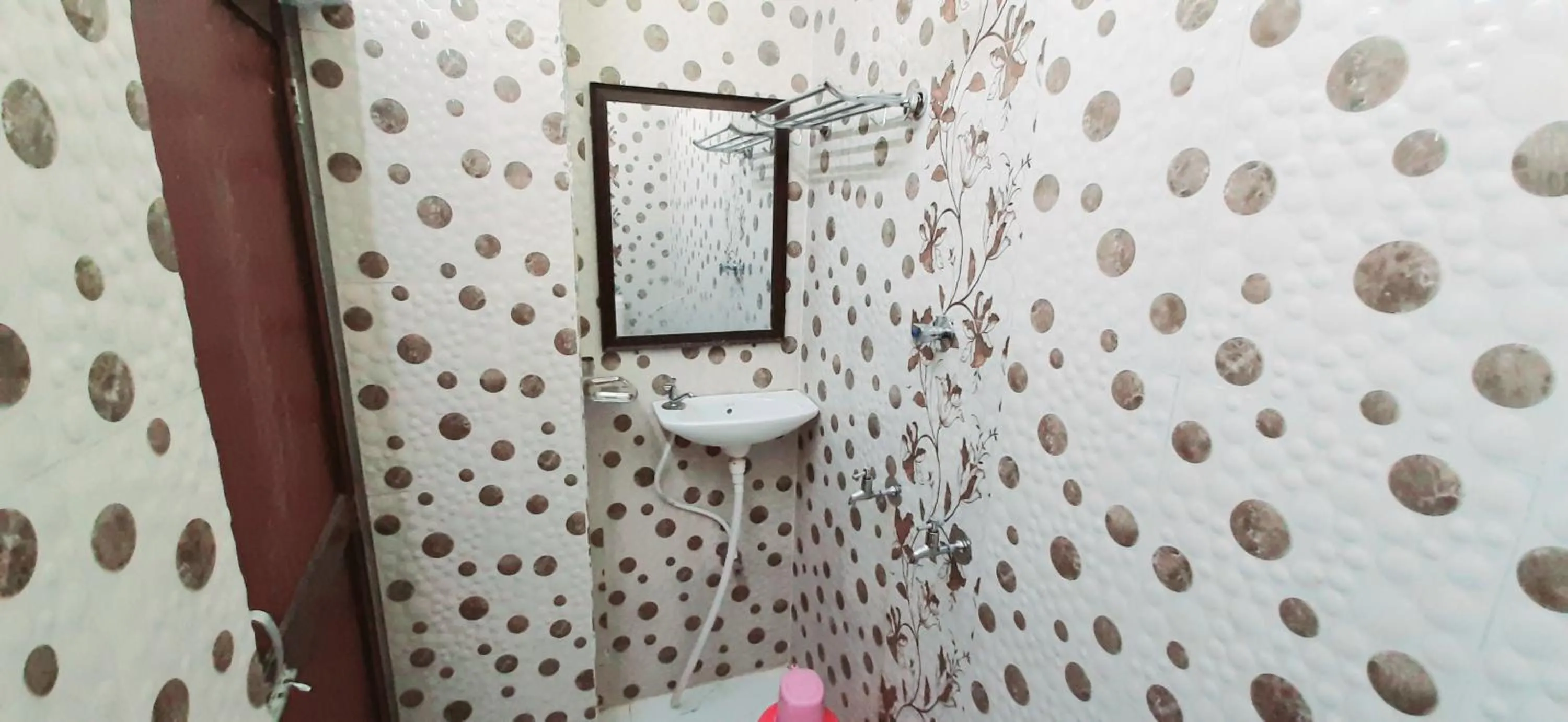 Bathroom in Luxmi Hotel