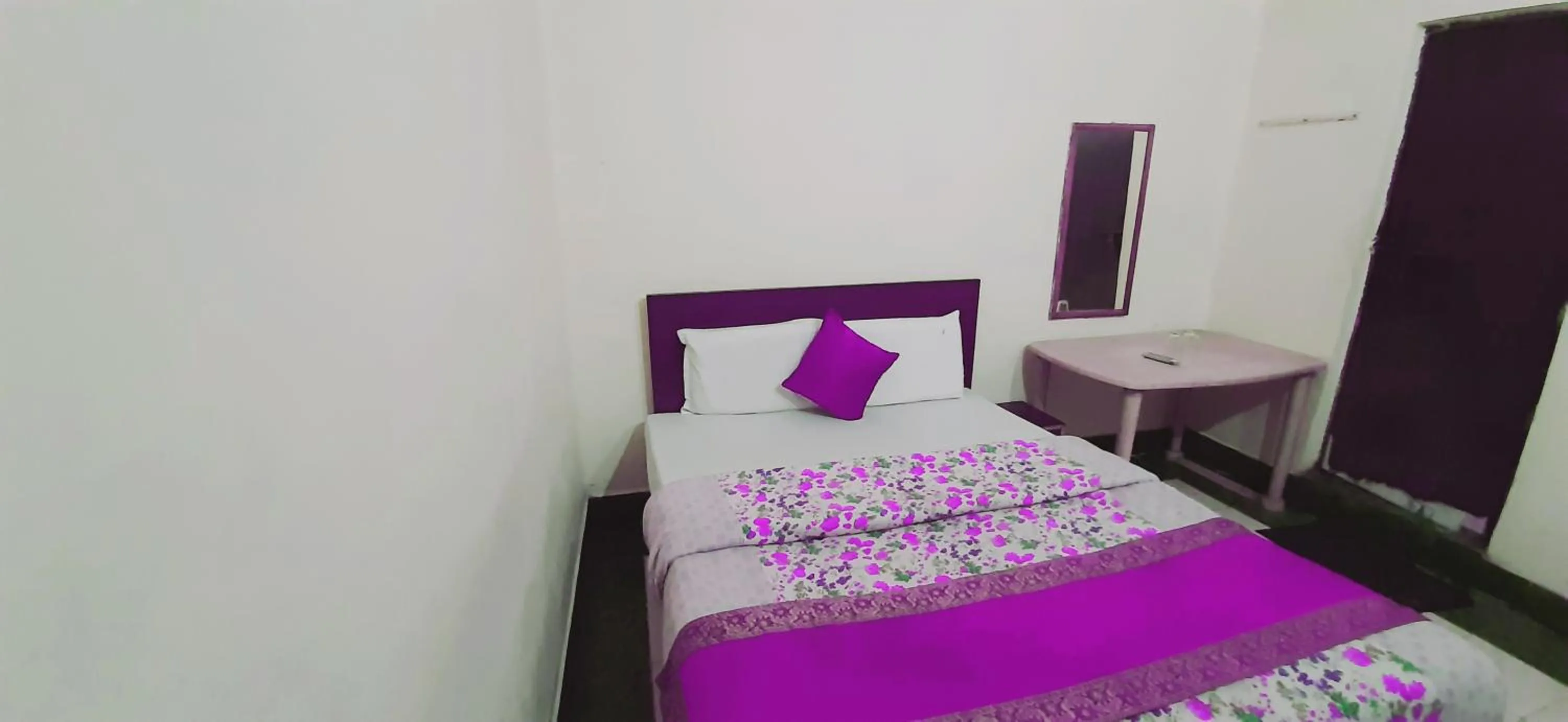 Photo of the whole room, Bed in Luxmi Hotel