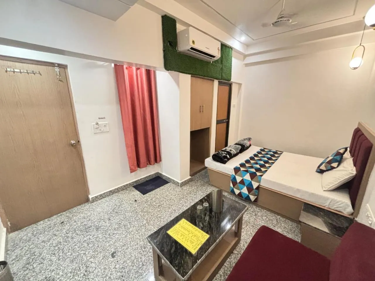 air conditioner, Bed in Luxmi Hotel