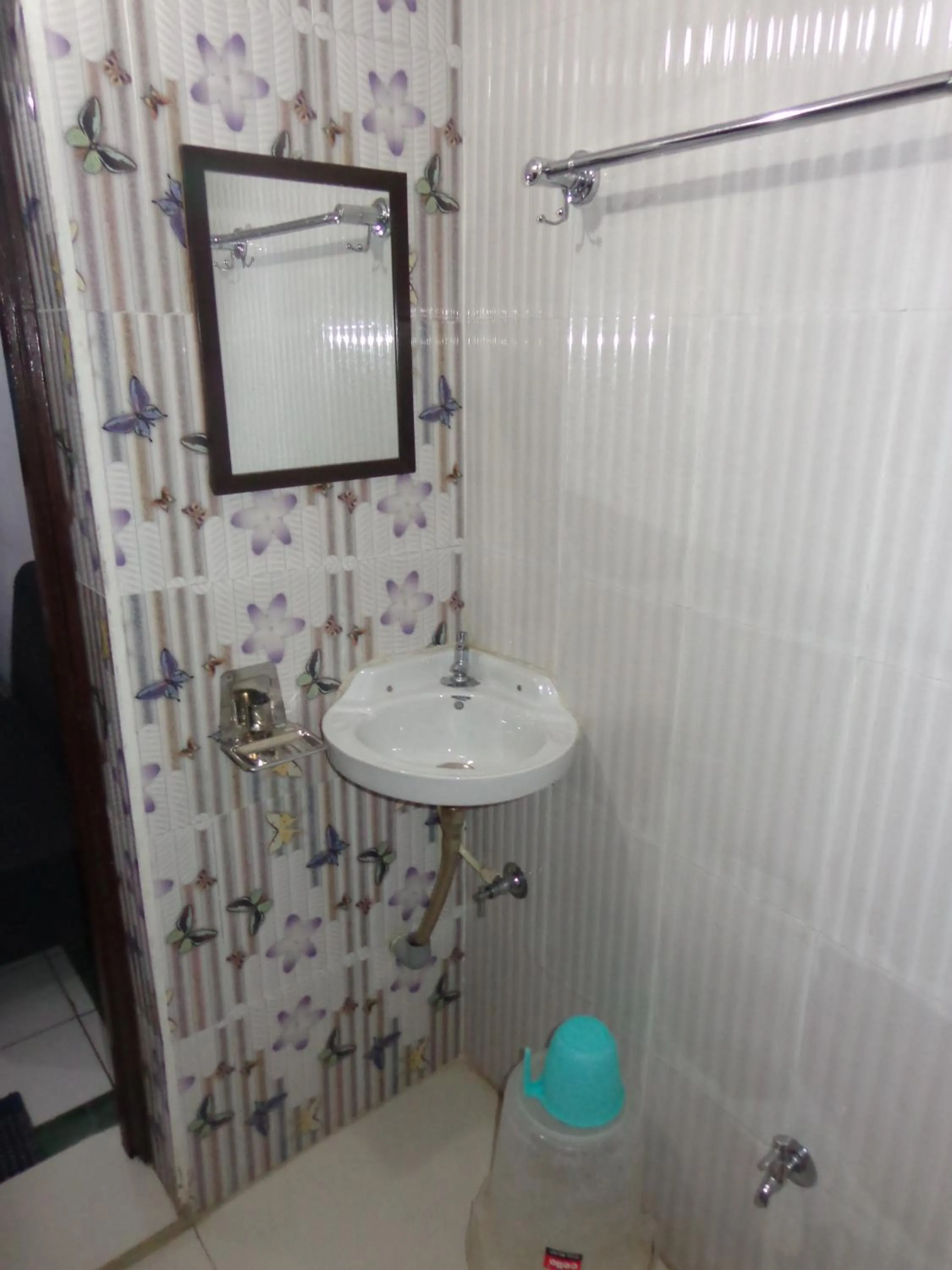 Bathroom in Luxmi Hotel