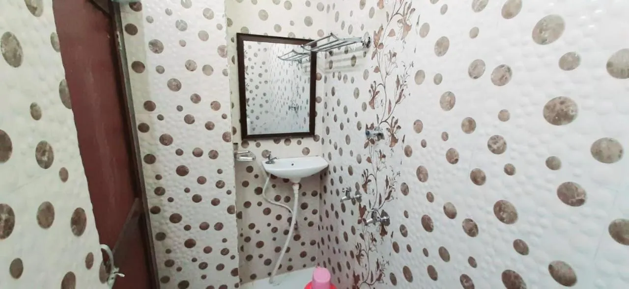 Bathroom in Luxmi Hotel