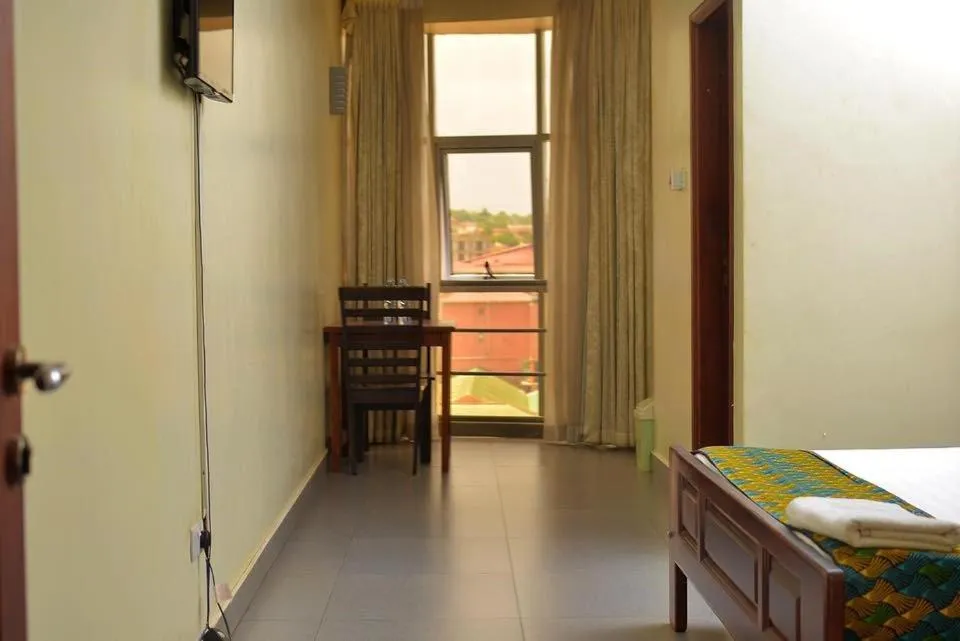 Bed in Kenendia Hotel