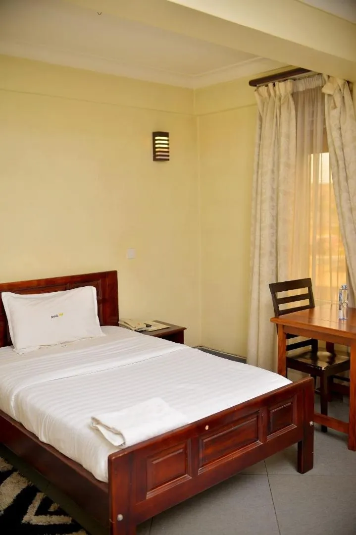 Bed in Kenendia Hotel