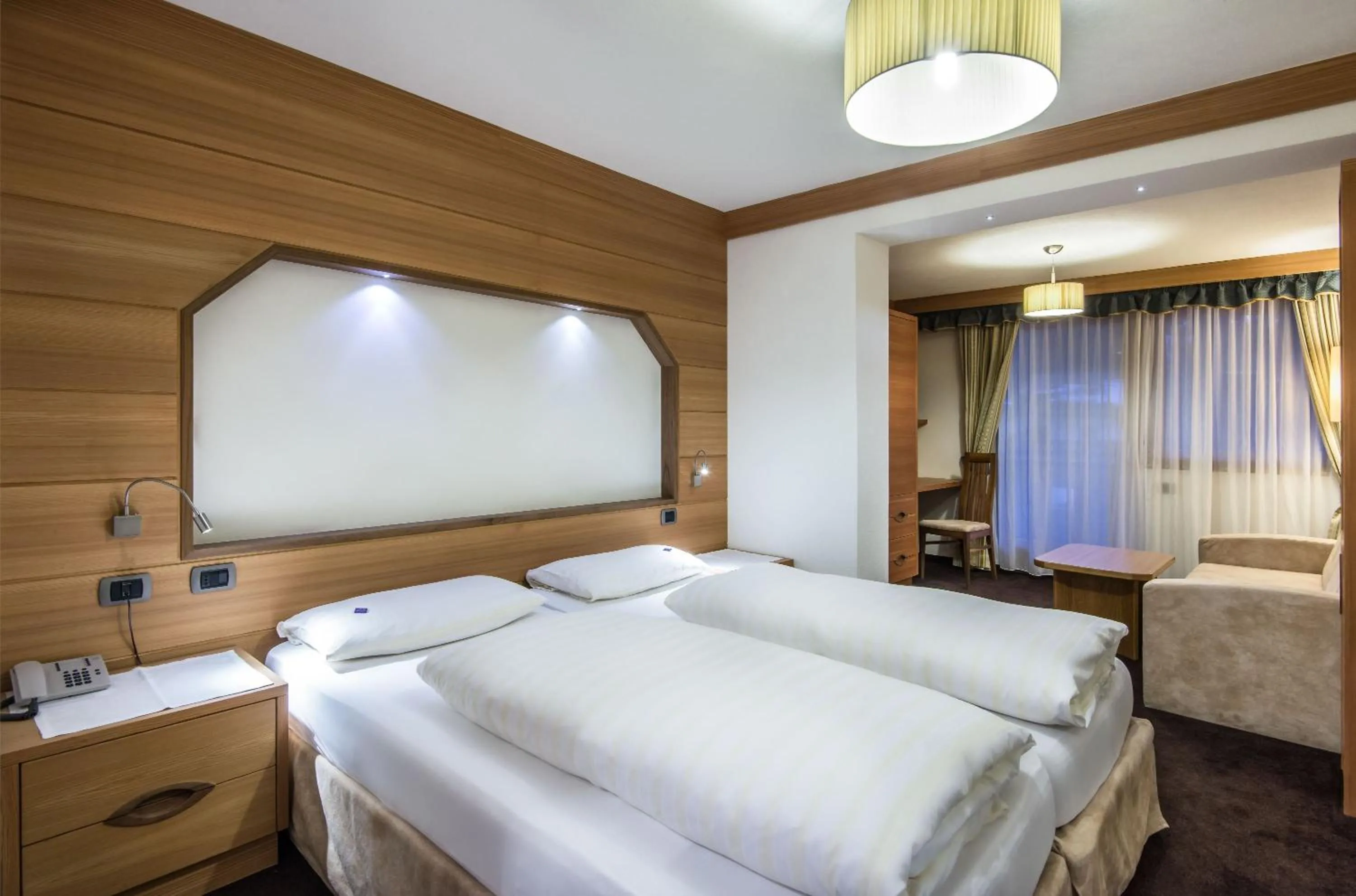 Bed in Albergo Posta Pederoa