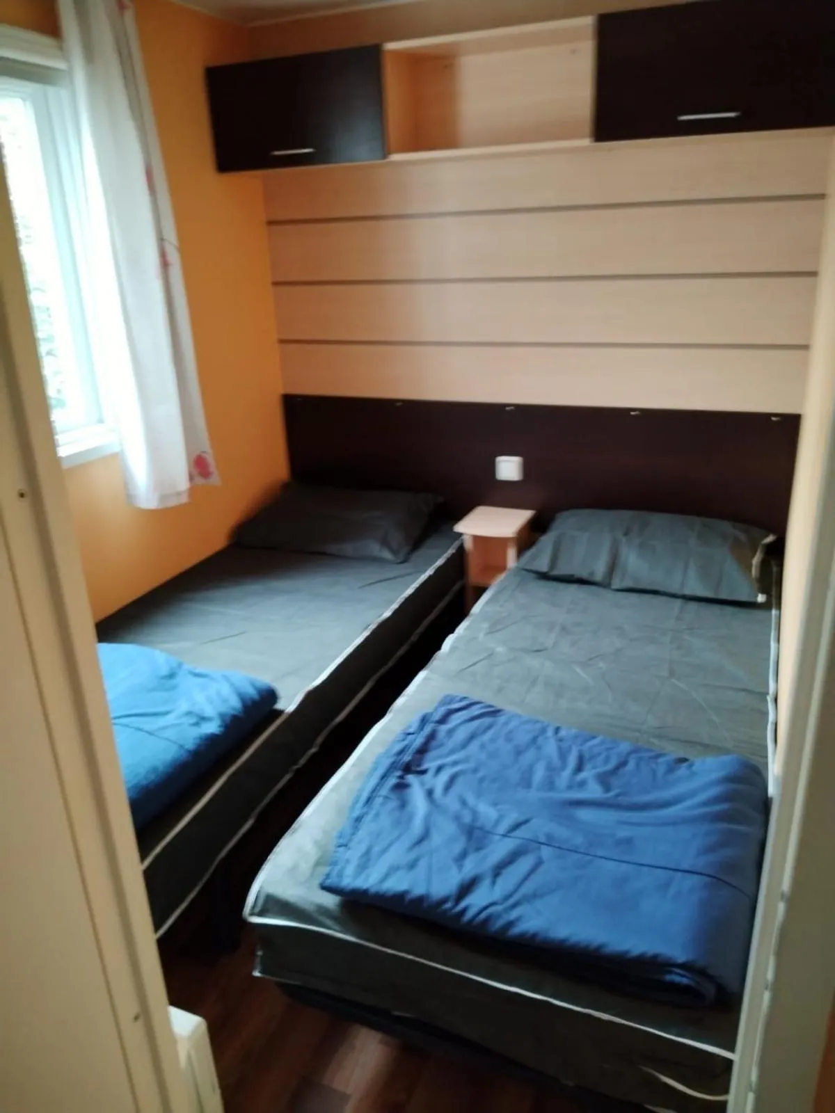 Bed in MOBIL HOME 43 dans Camping 4 Etoiles