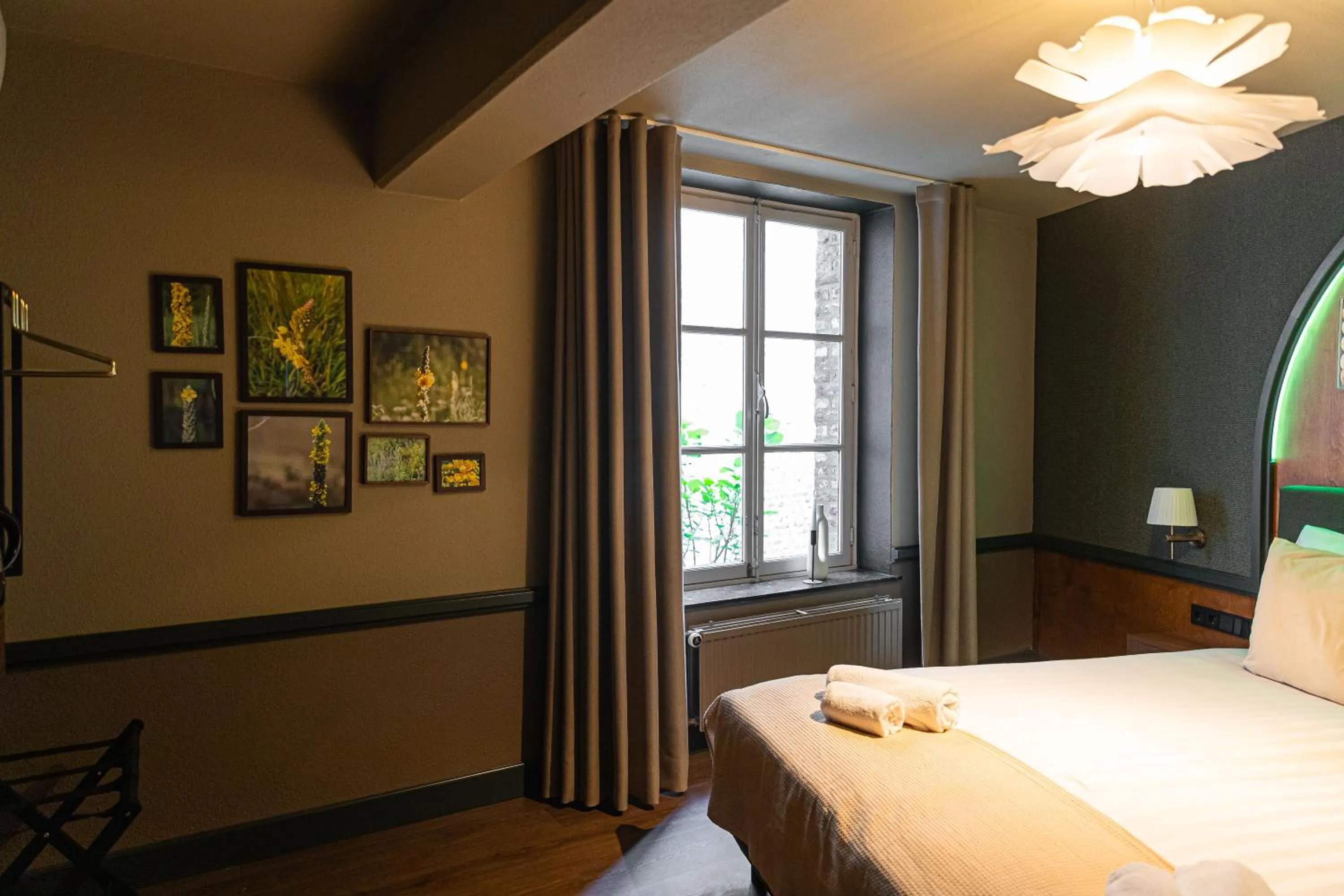 Bed in Buitenplaats Kasteel Elsloo