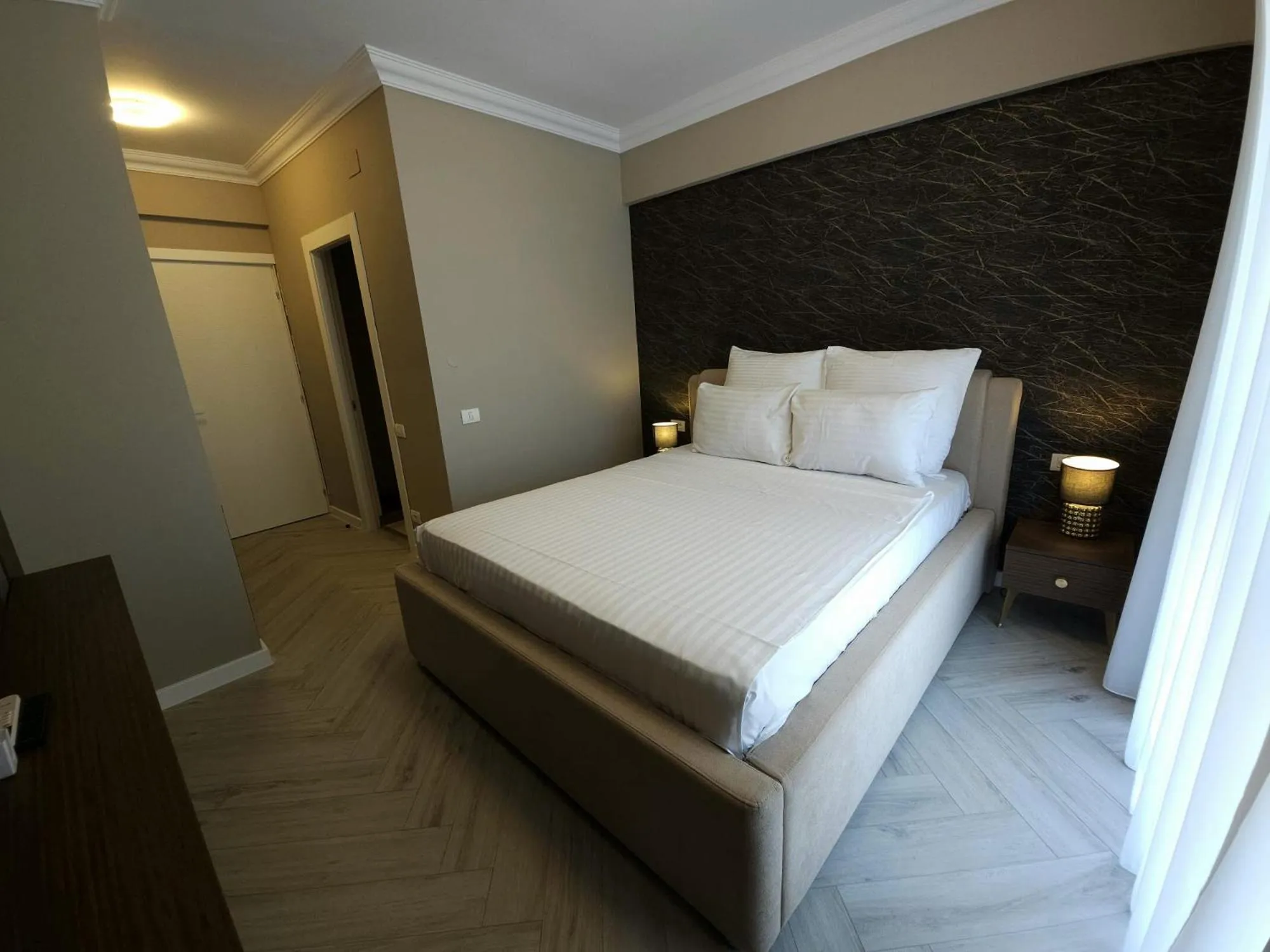 Bed in Ganzo Boutique Hotel