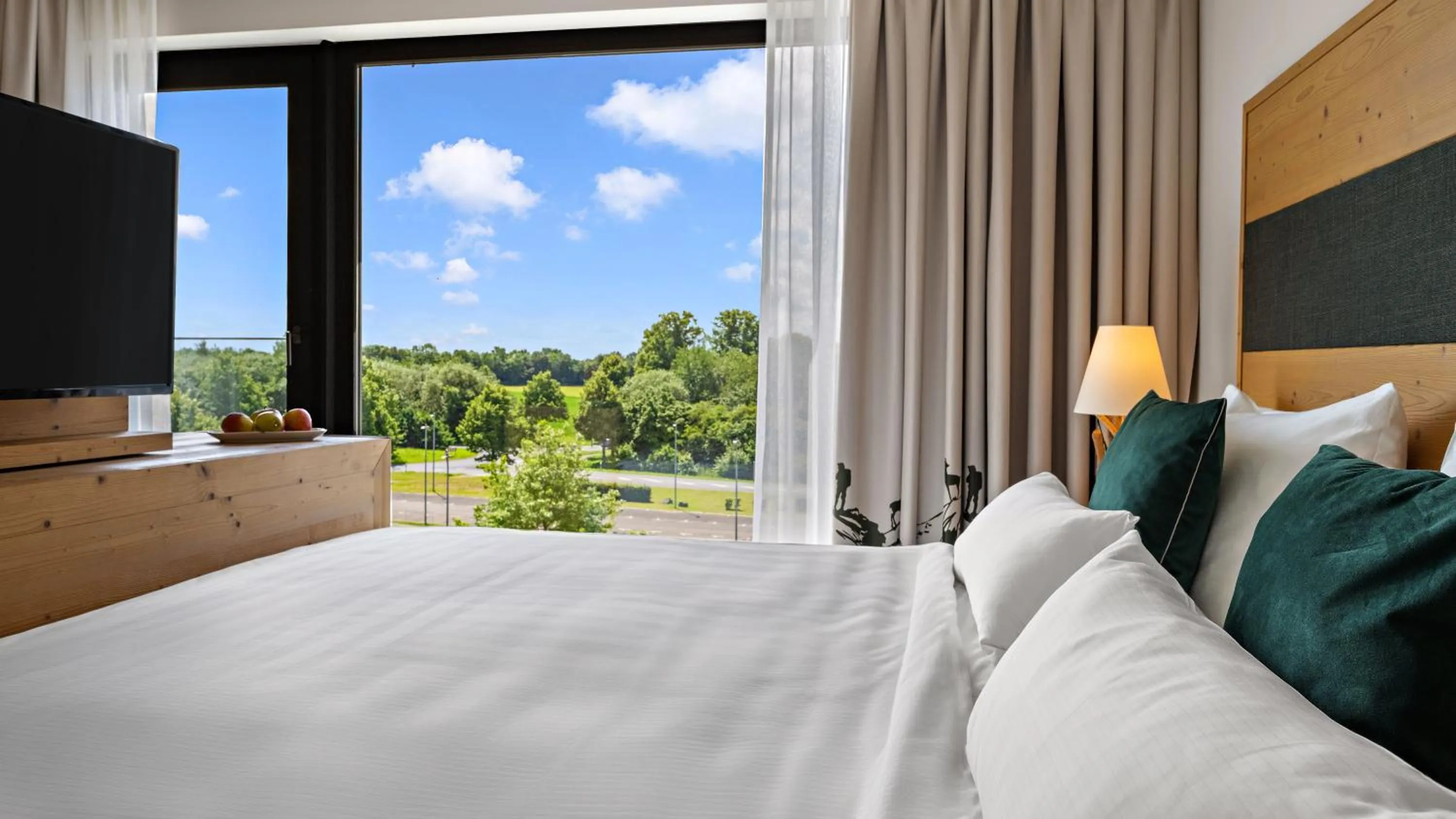 View (from property/room), Bed in Hotel Fire & Ice Düsseldorf/Neuss