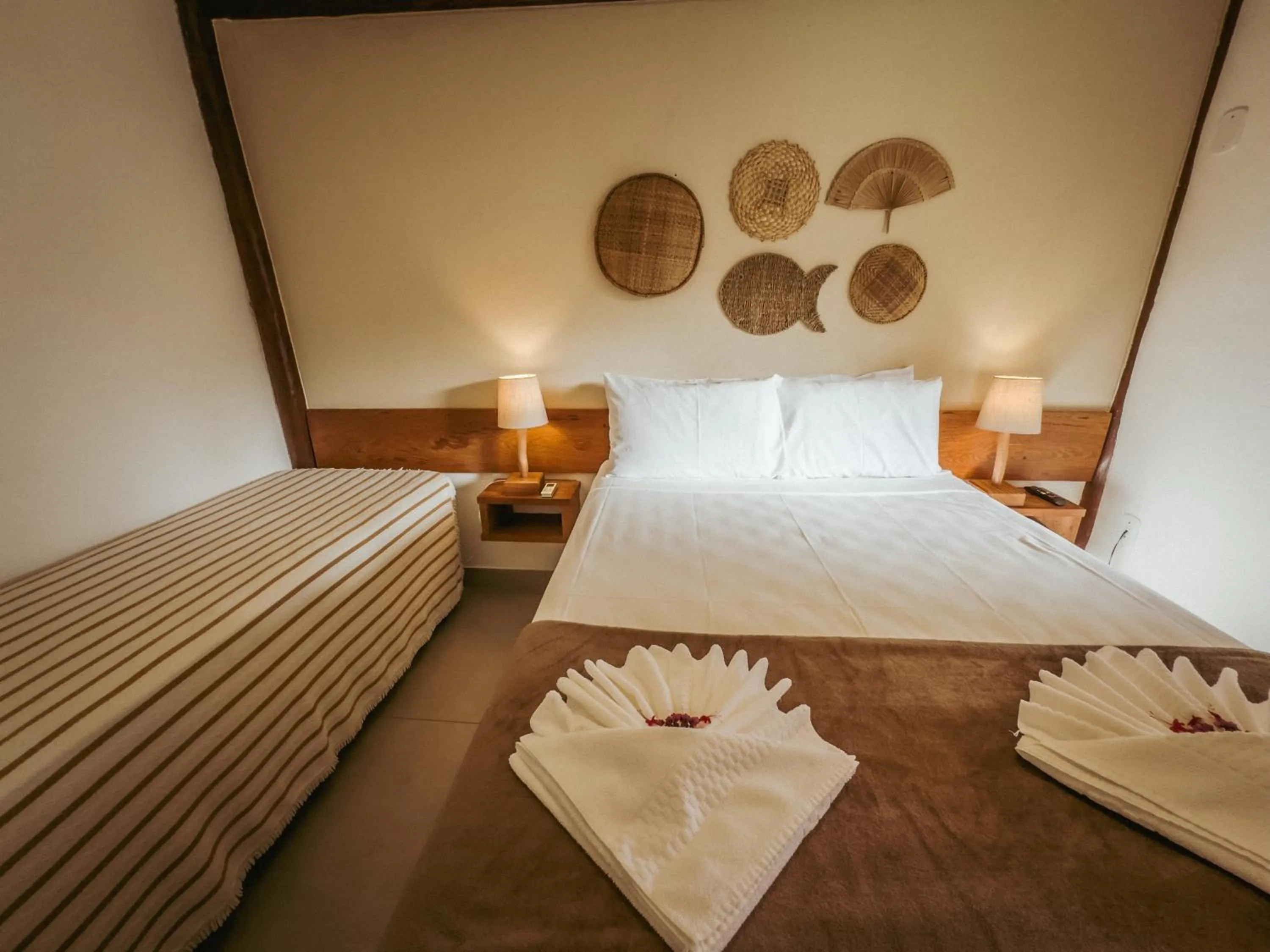 Bed in Tororao Hotel Pousada