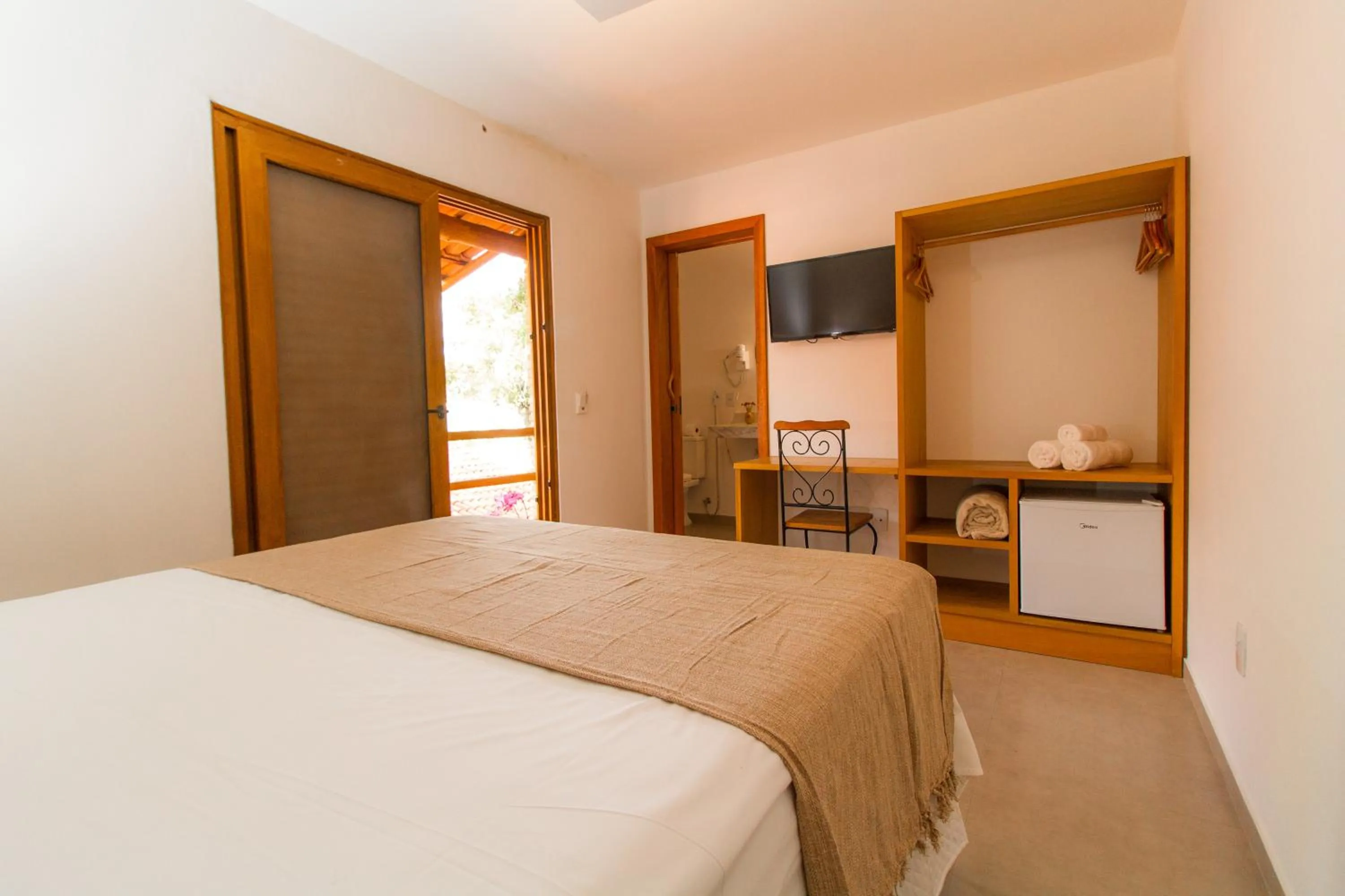 Bed in Tororao Hotel Pousada