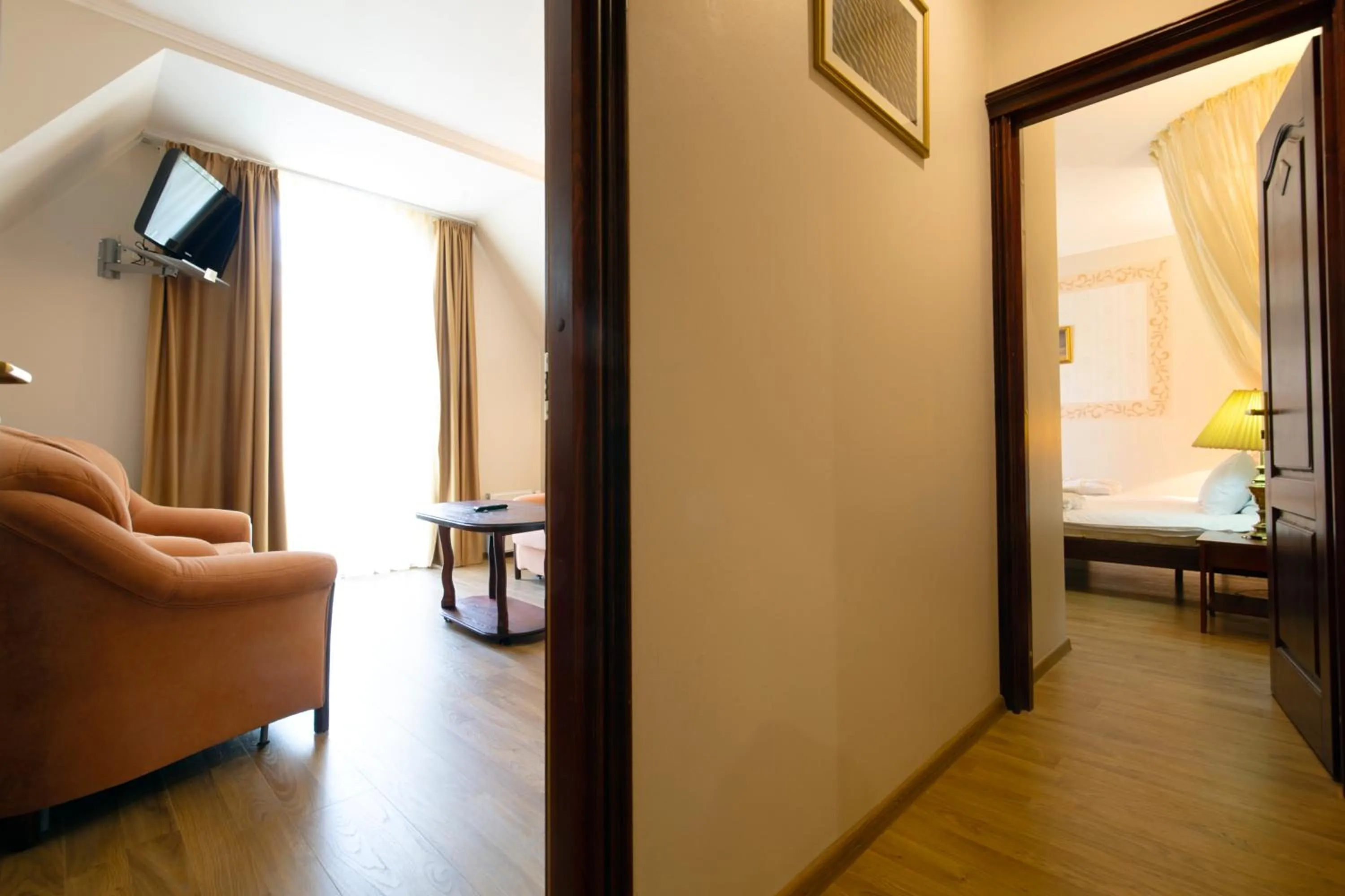 Living room, Bed in Pegasa Pils Spa Hotel