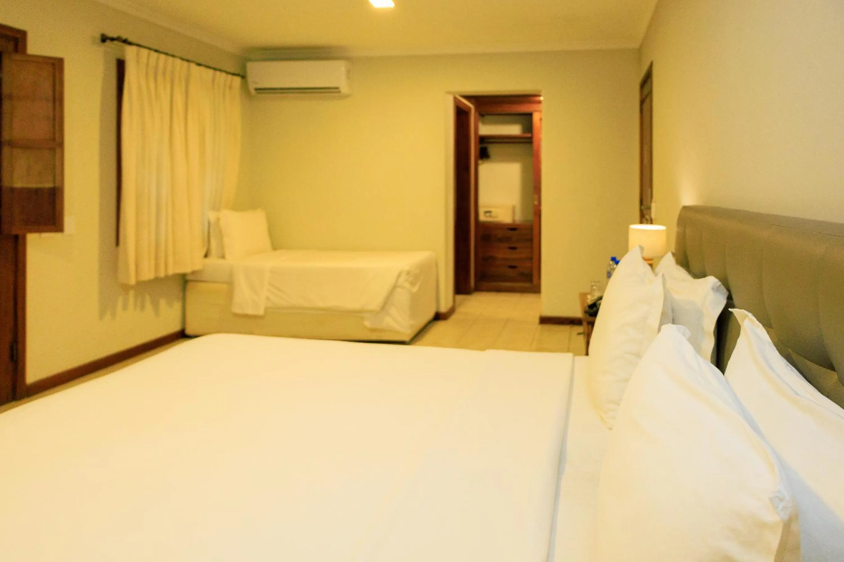 Bed in Vila Angatu Eco Resort & SPA