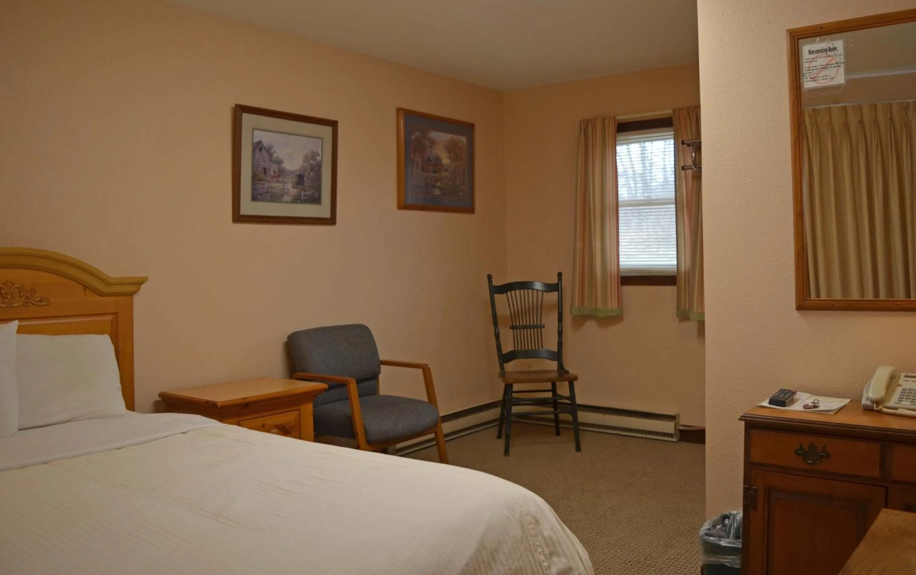 Bed in Little River Inn Motel