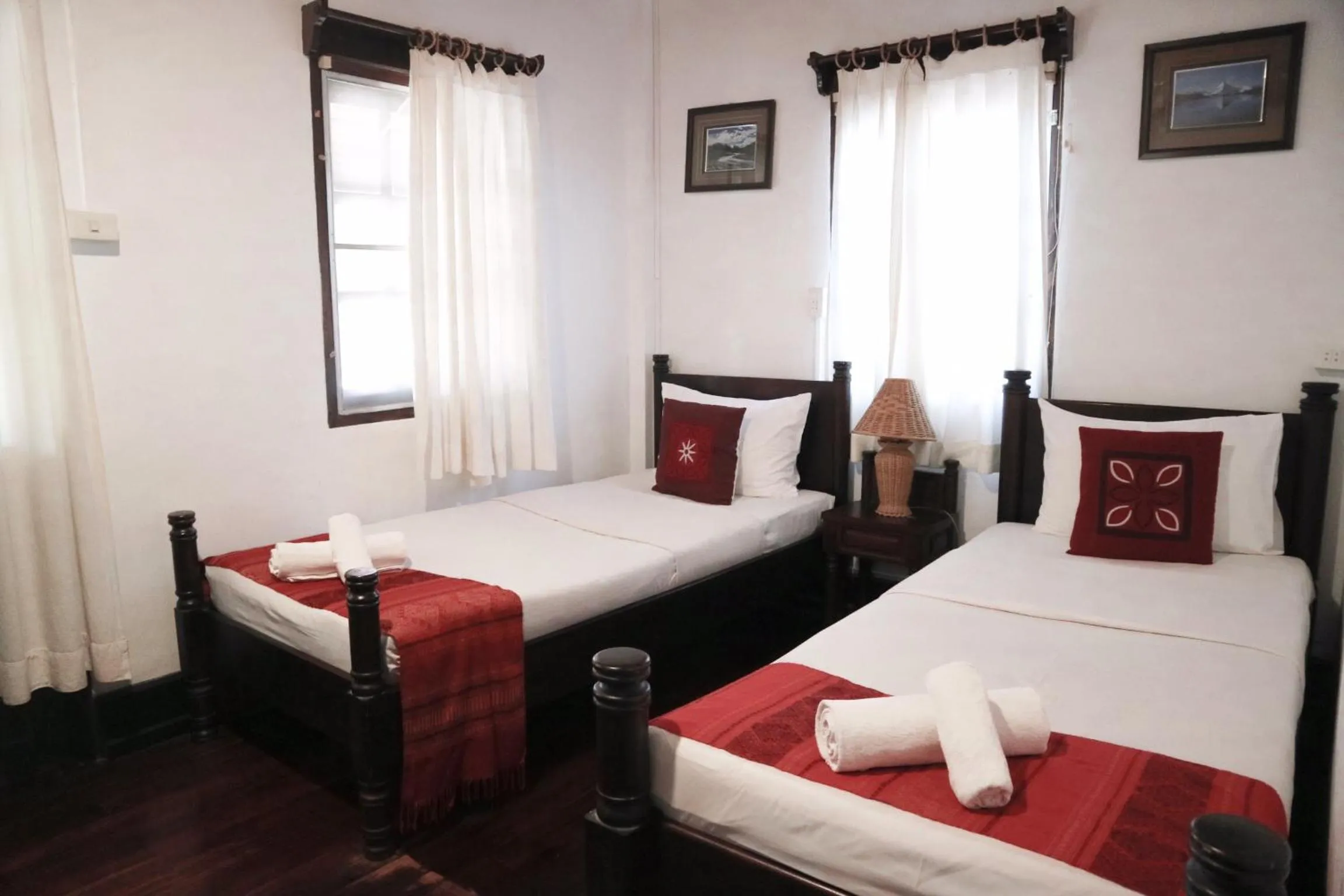 Bed in Villa Senesouk Luang Prabang