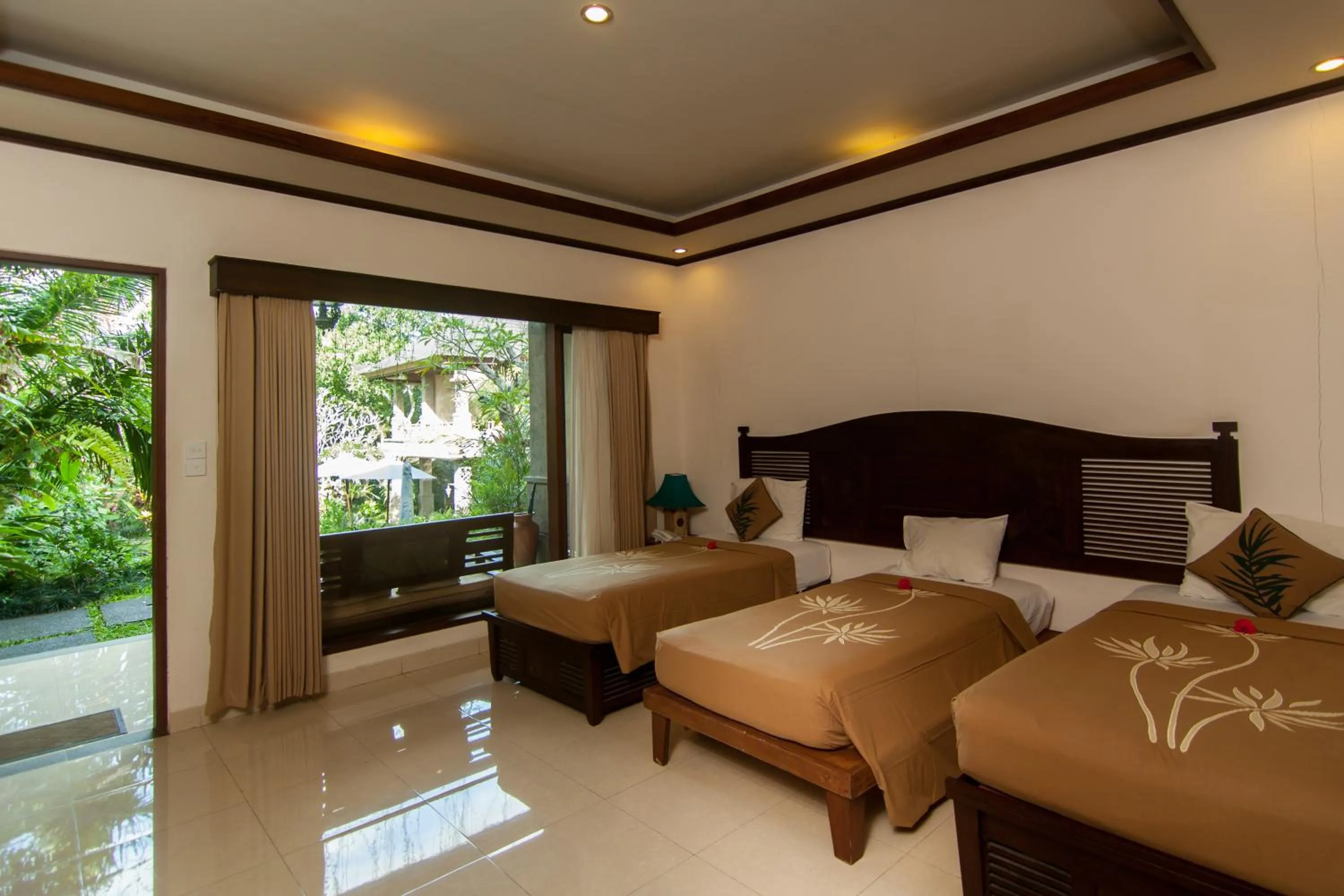 Bed in De Munut Balinese Resort