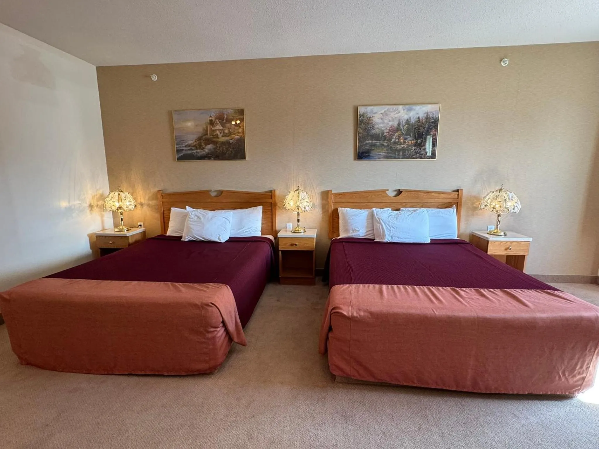 Bed in Western Budget Motel Ponoka