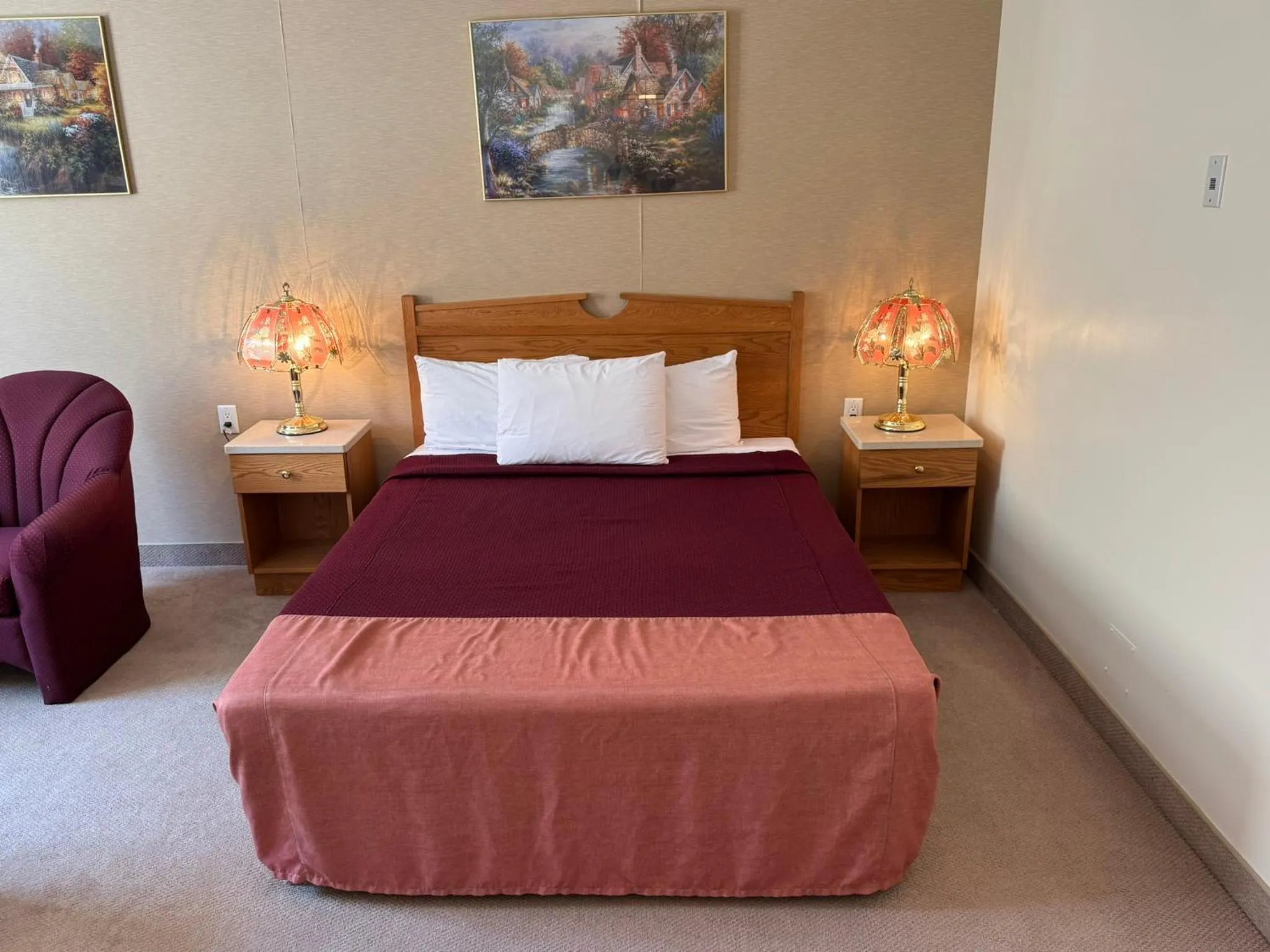 Bed in Western Budget Motel Ponoka