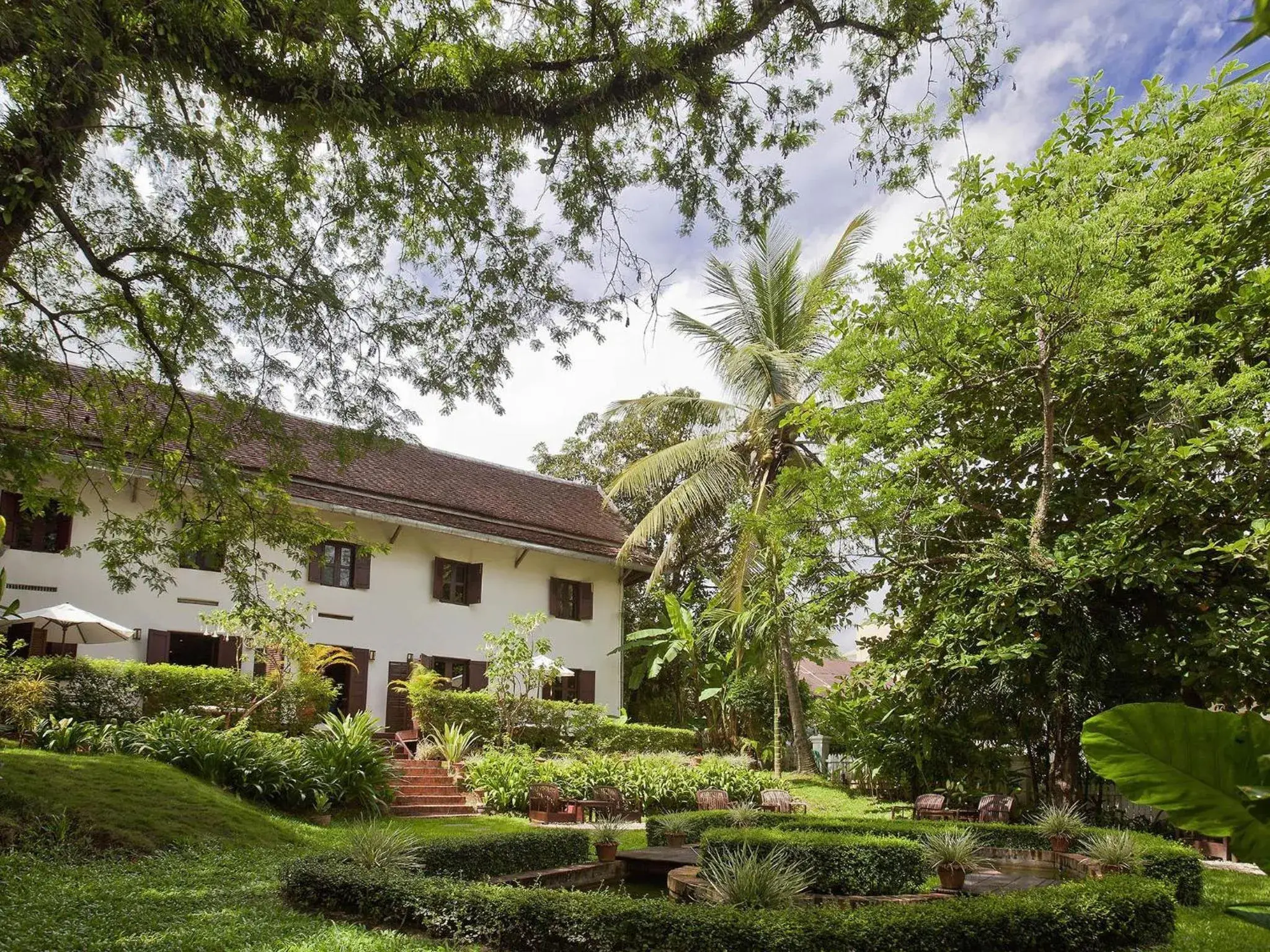 Bedroom in 3 Nagas Hotel Luang Prabang - MGallery Collection Bedroom in 3 Nagas Hotel Luang Prabang - MGallery Collection