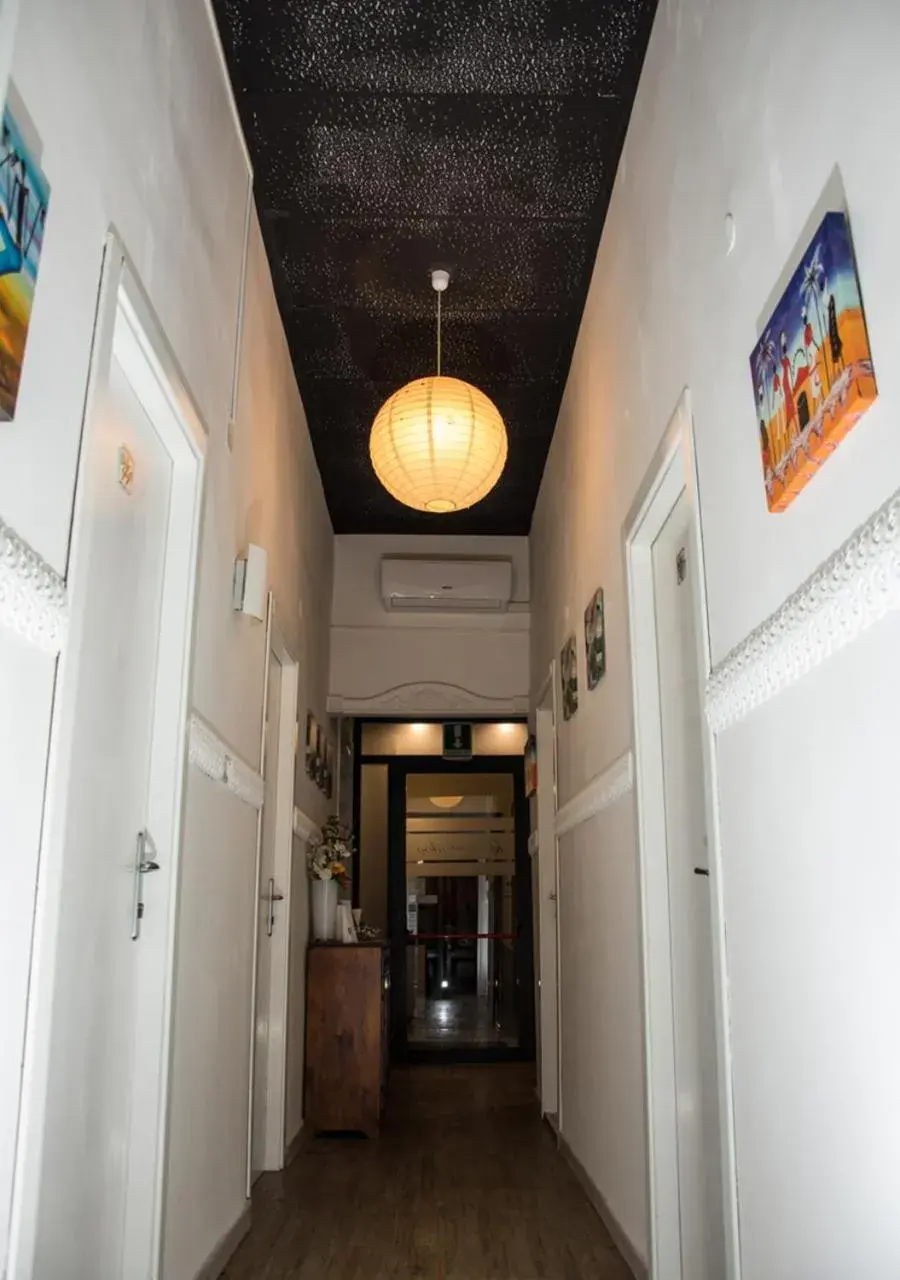 Communal lounge/ TV room in Hotel Le Orchidee Communal lounge/ TV room in Hotel Le Orchidee