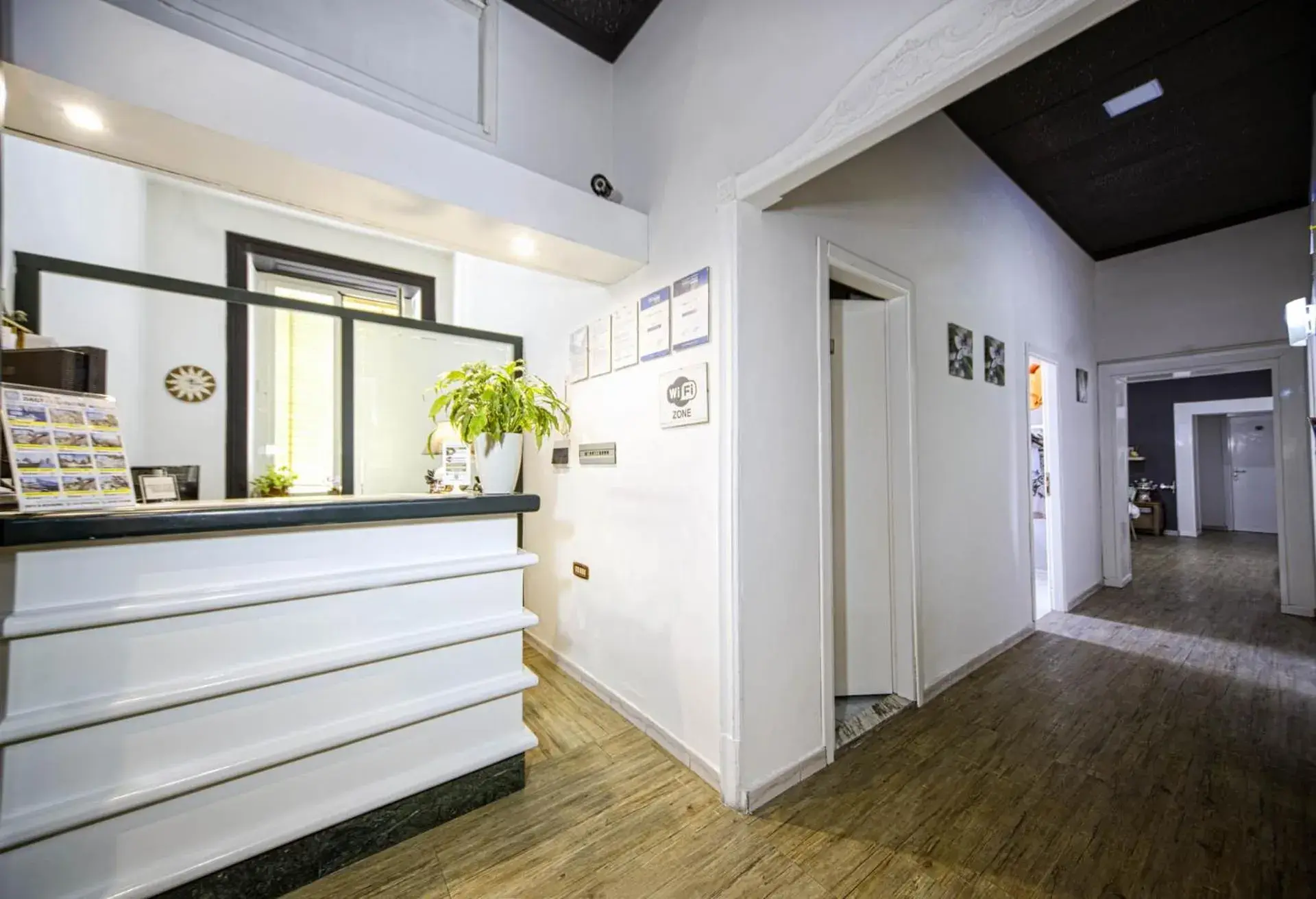 Lobby or reception in Hotel Le Orchidee Lobby or reception in Hotel Le Orchidee