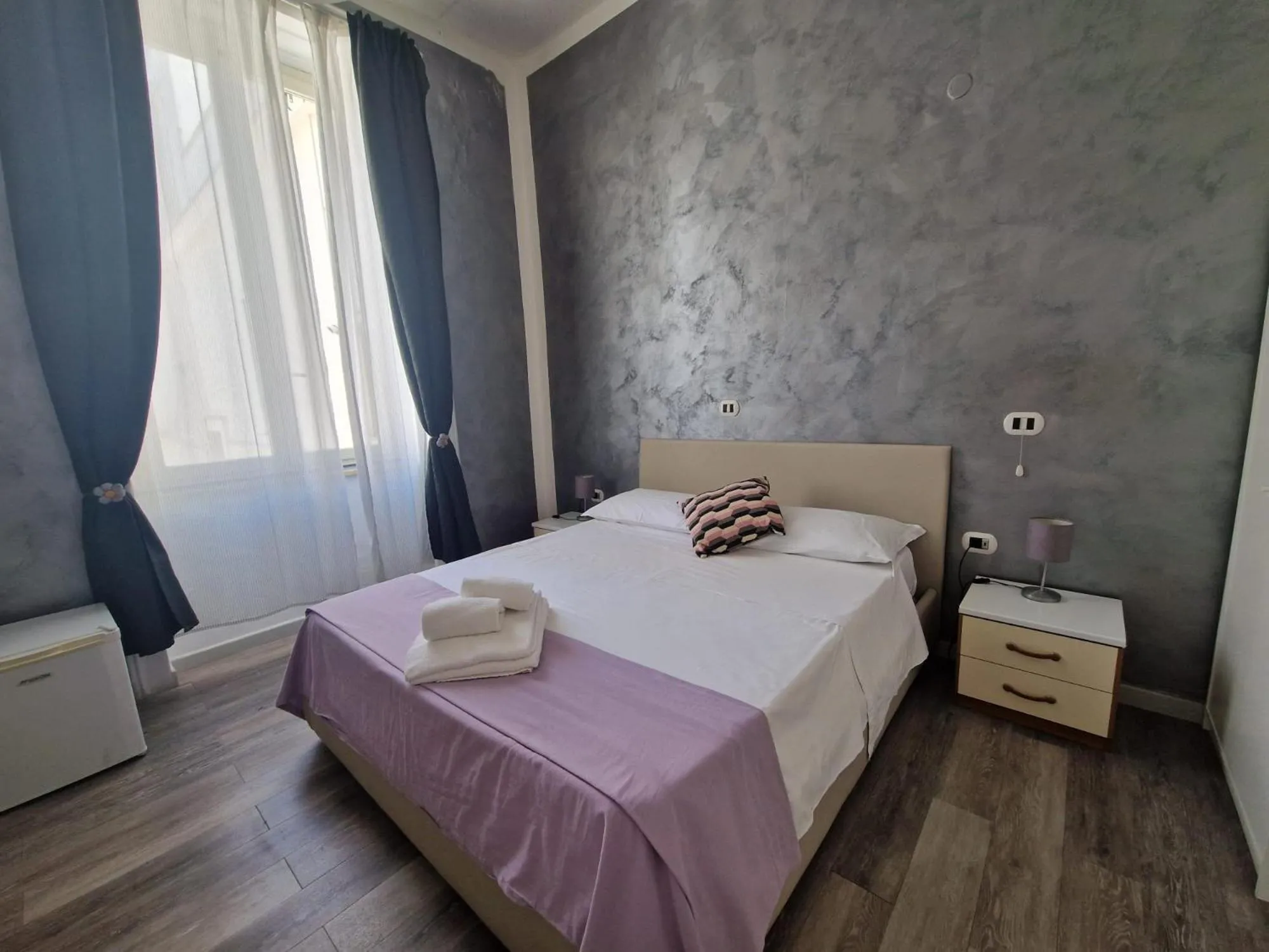 Bed in Hotel Le Orchidee