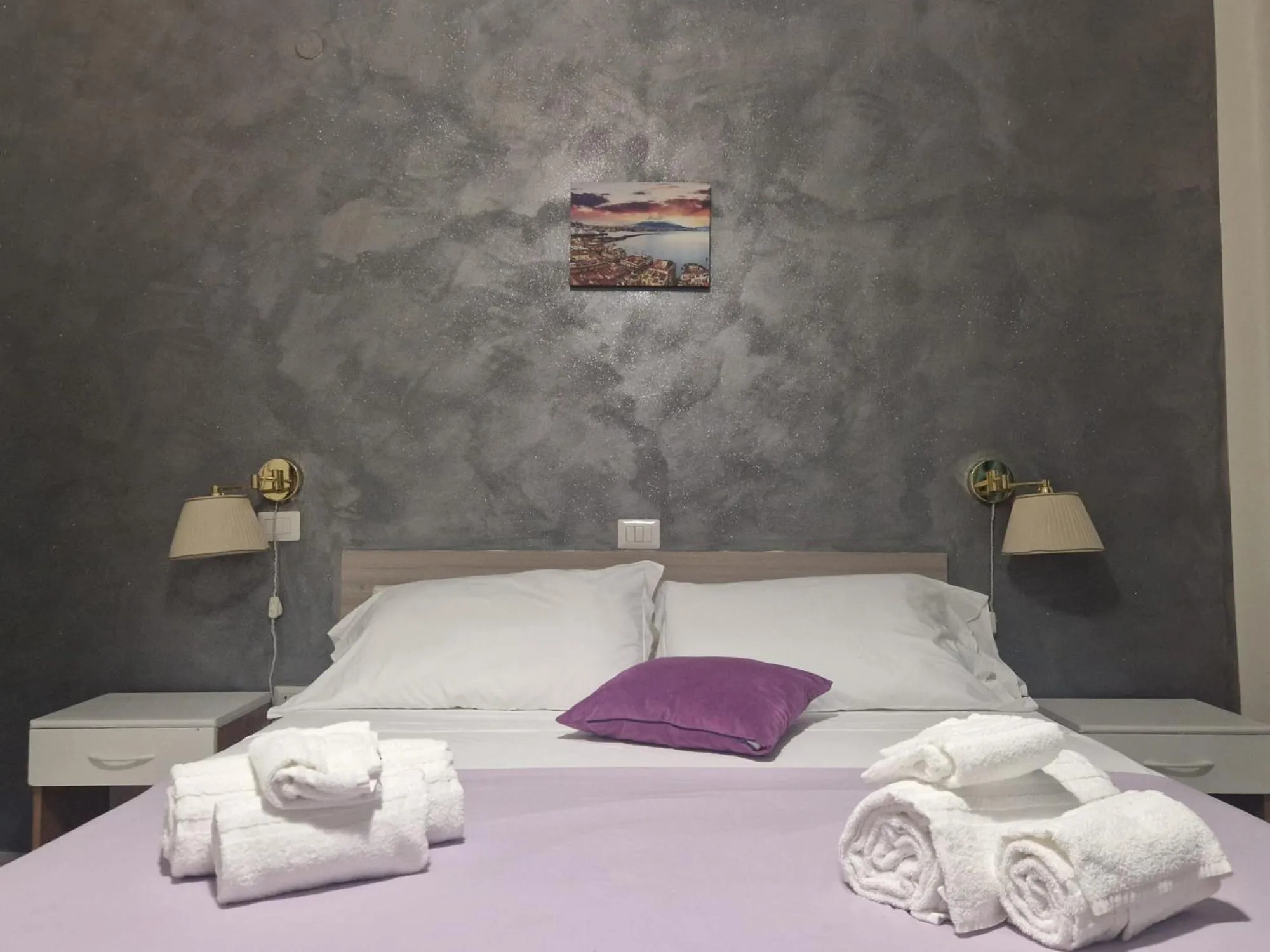 Bed in Hotel Le Orchidee