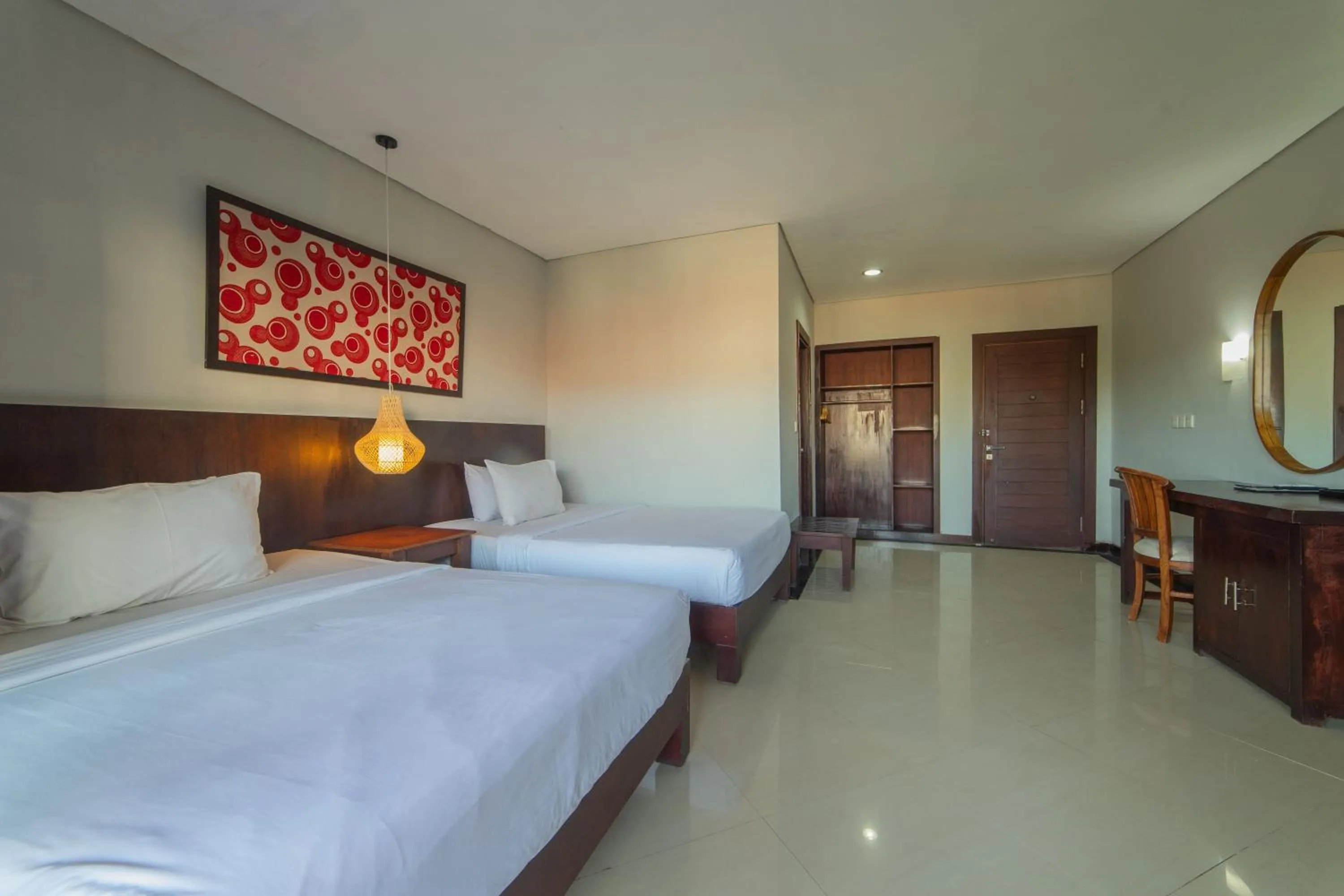 Bed in Nirmala Hotel Jimbaran
