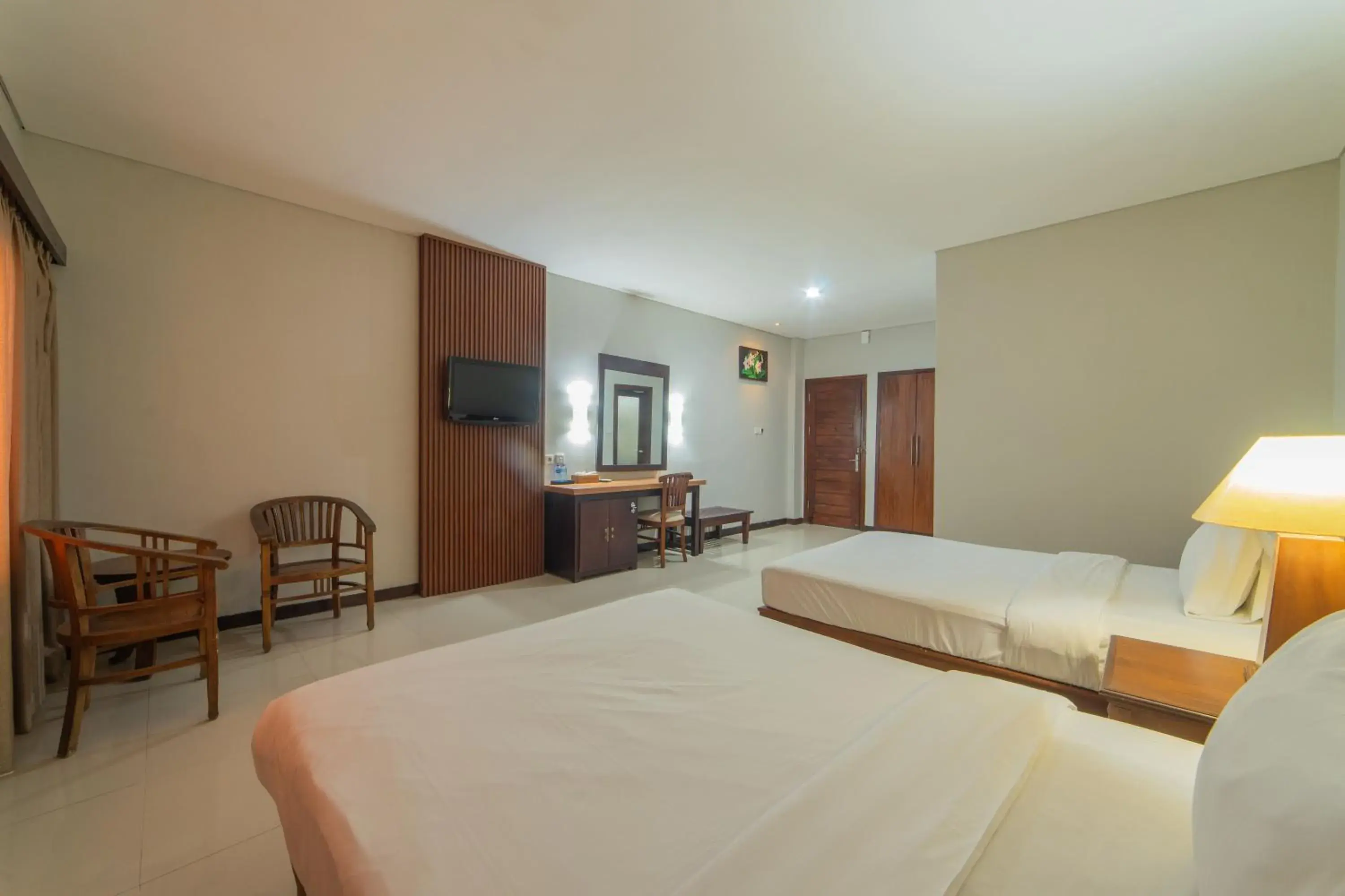 Bedroom, Bed in Nirmala Hotel Jimbaran Bedroom, Bed in Nirmala Hotel Jimbaran