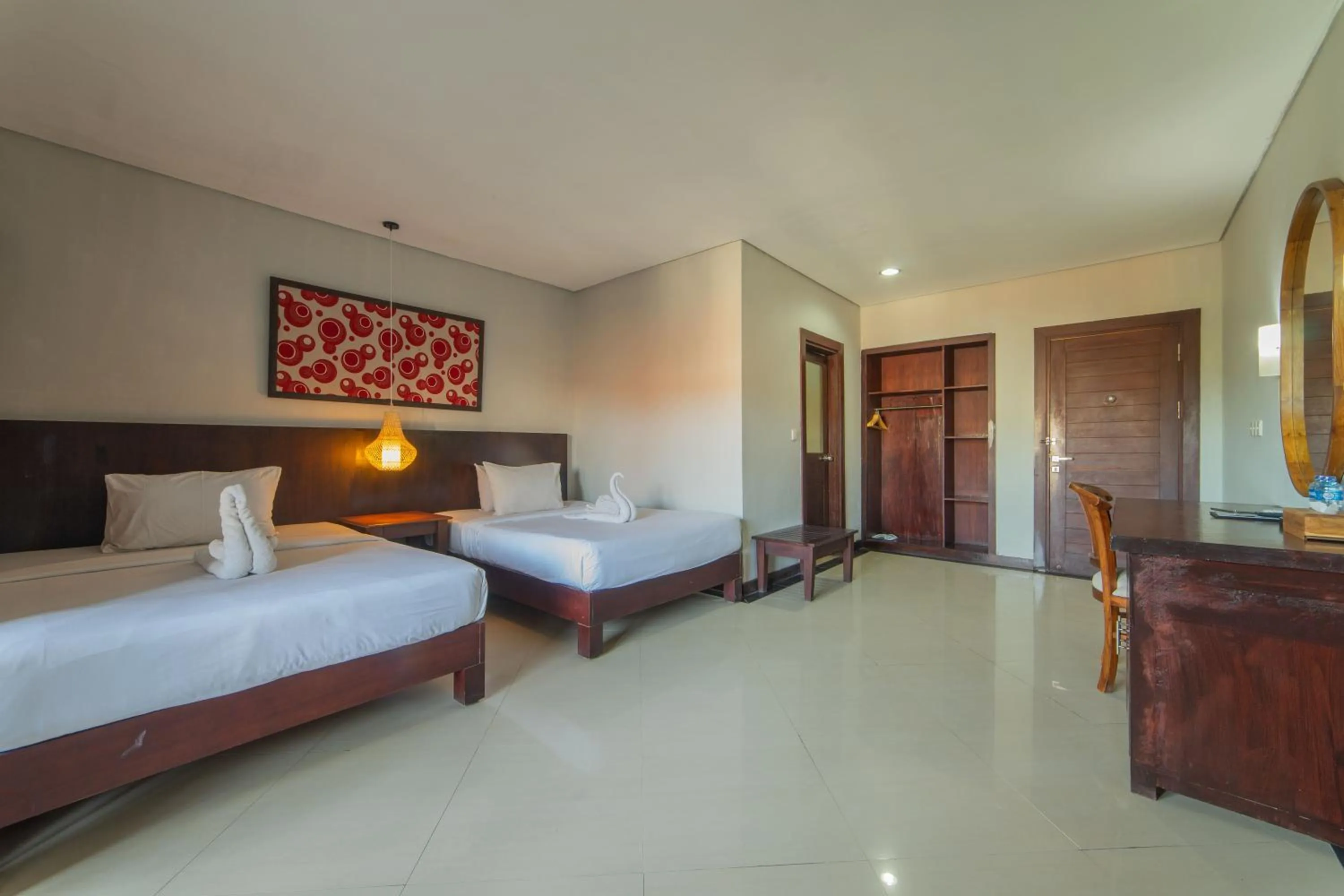 Bed in Nirmala Hotel Jimbaran