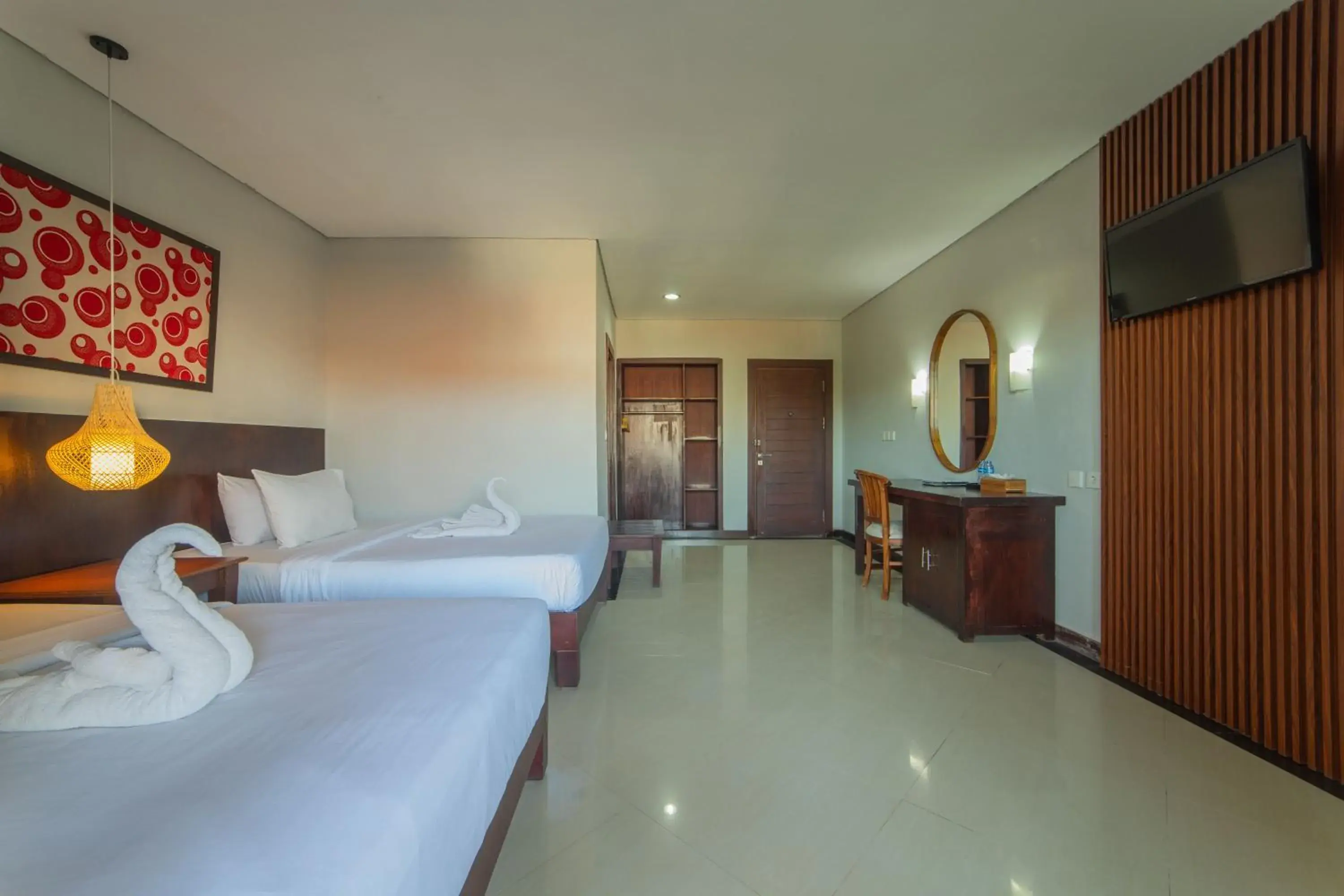 Deluxe Double Room with Balcony in Nirmala Hotel Jimbaran Deluxe Double Room with Balcony in Nirmala Hotel Jimbaran