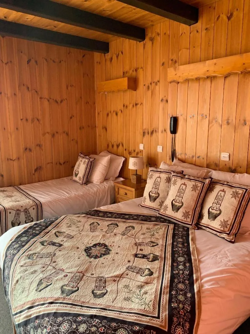 Bed in Hotels Les Catrems & Le Montagnou