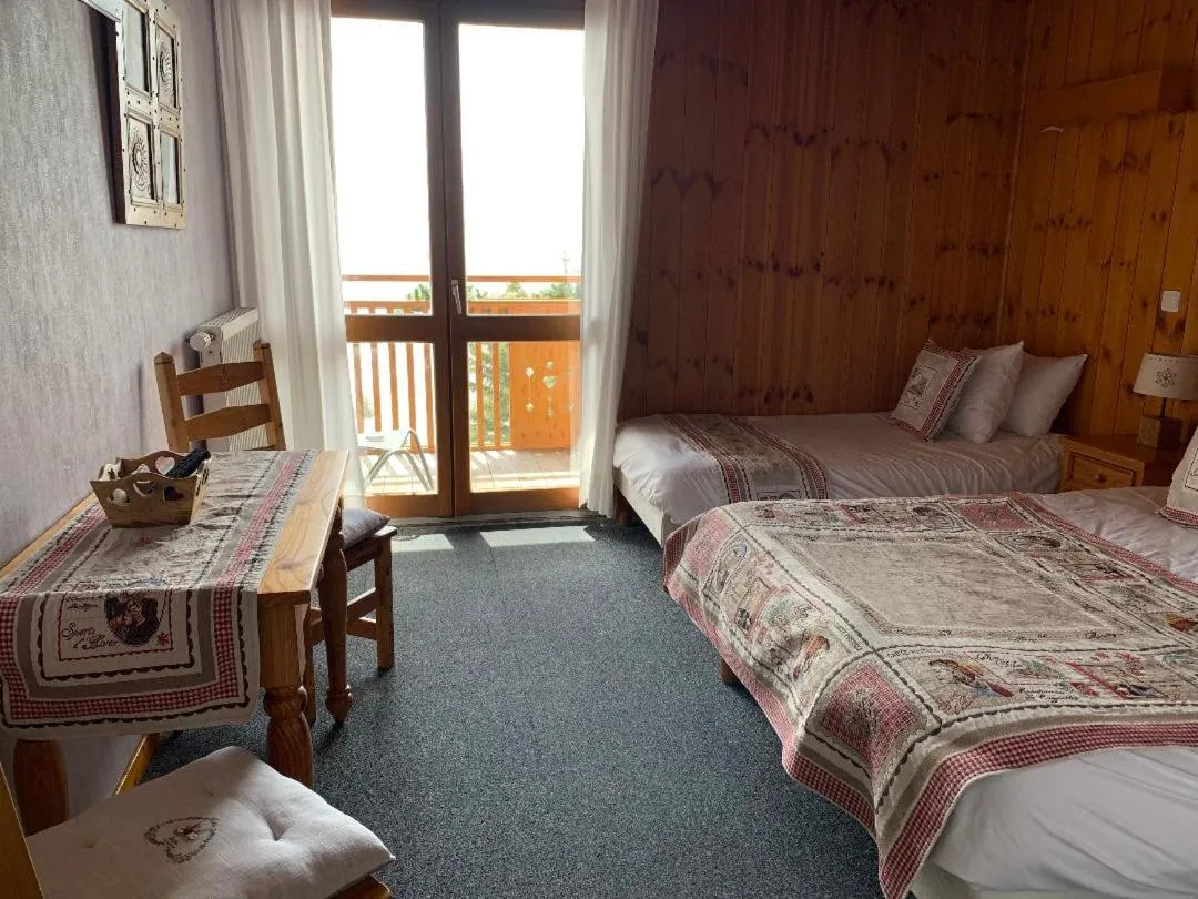 Balcony/Terrace, Bed in Hotels Les Catrems & Le Montagnou