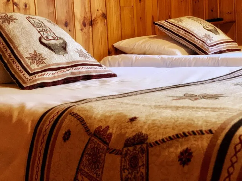 Bed in Hotels Les Catrems & Le Montagnou