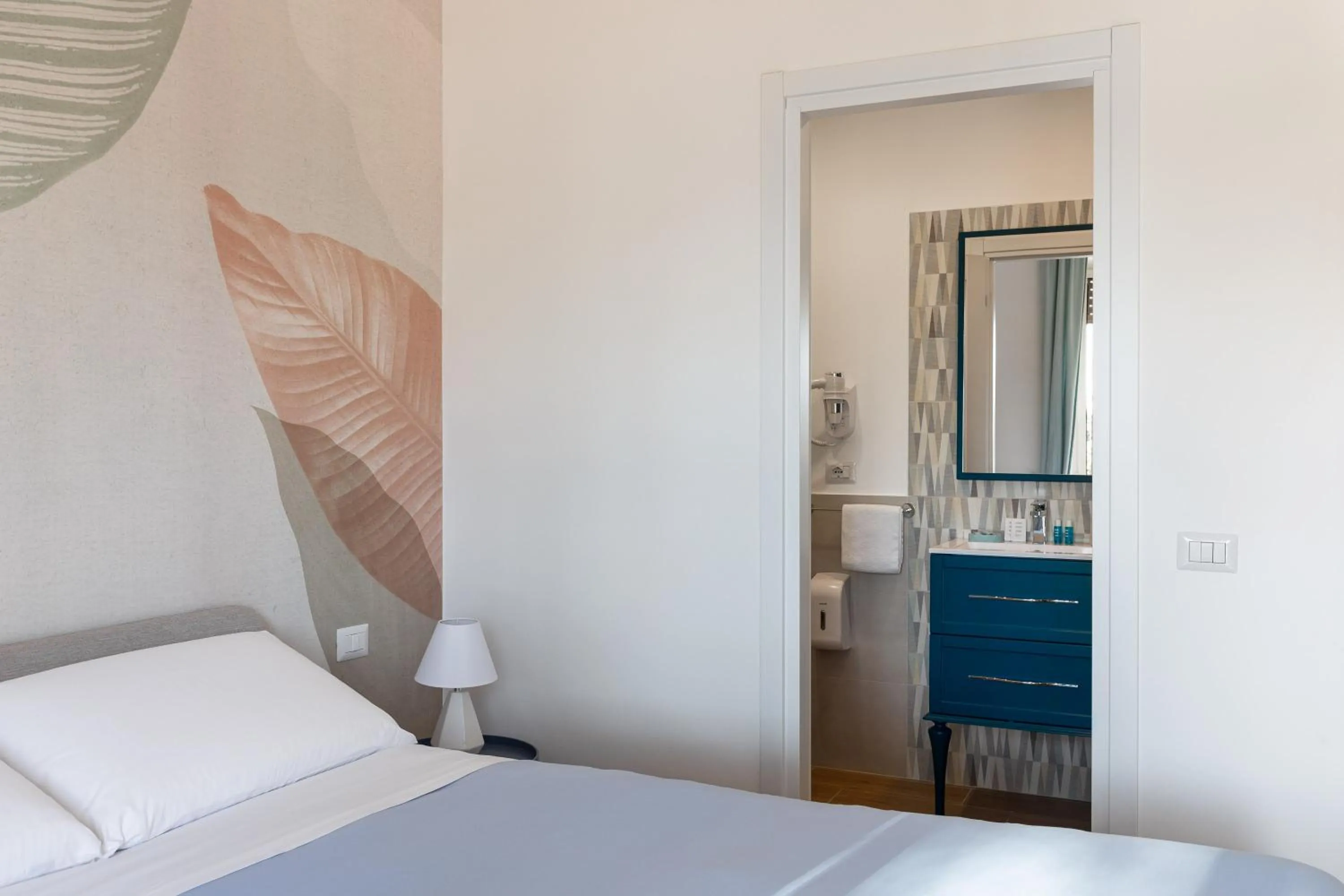 Bed in B&B Vitruvio Suites